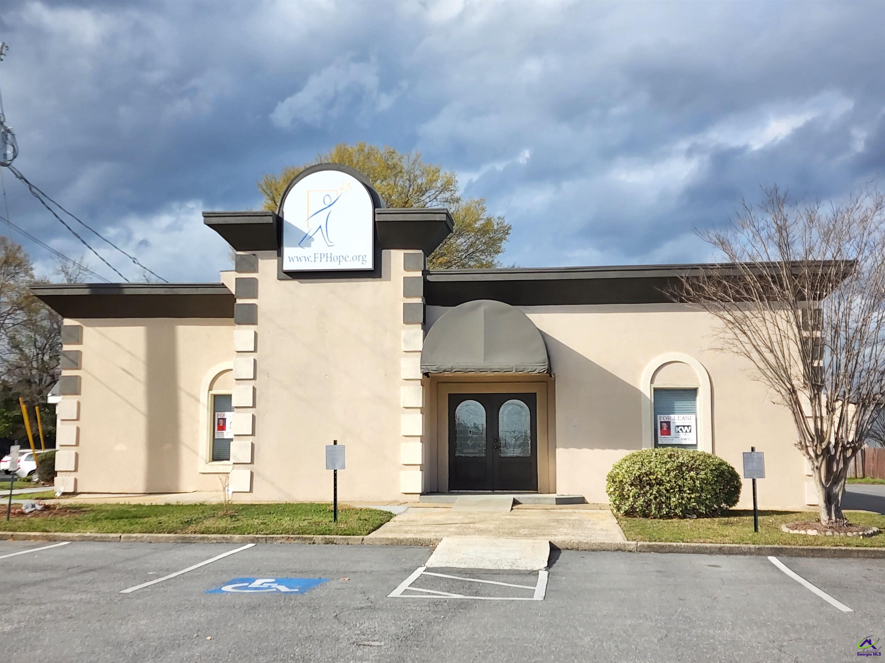 Discover a prime commercial property for lease on Watson Boulevard, strategically located in a bustling area with a daily traffic count of 34,400. The main building spans 3,855 square feet, featuring a welcoming waiting area, spacious reception, front office, approximately 12 additional offices, a large break room, two full bathrooms with walk-in tiled showers, and a half bath. An additional 600-square-foot building, once a conference room, complements the space. Perfect for medical or dental offices, real estate agencies, training facilities, non-profits, and more. With ample space and boundless potential, seize this opportunity now! Call today for more information or to schedule a showing.