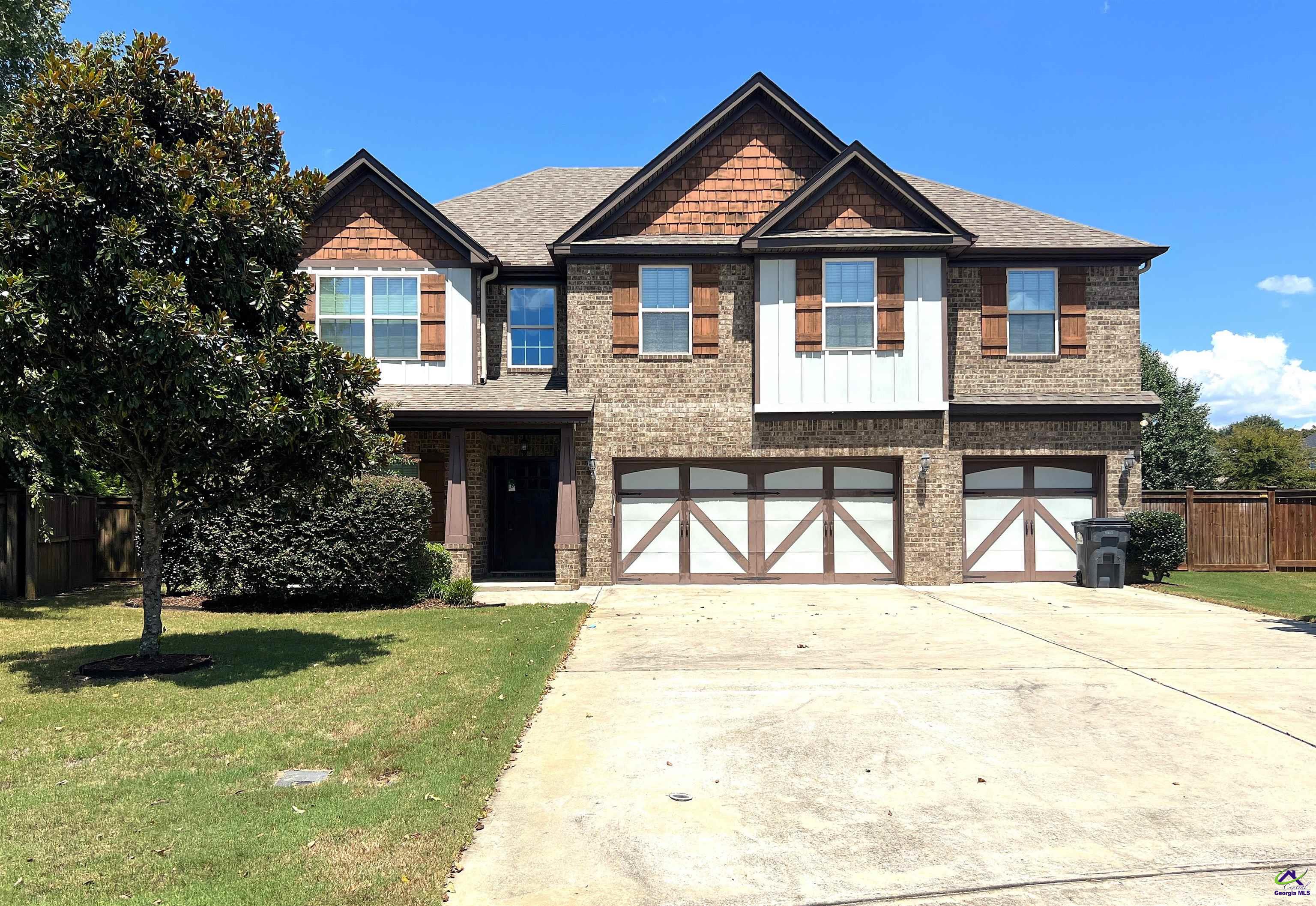 Gorgeous 5 bed, 3 bath, 3 car garage all brick home. Open concept kitchen boasts of breakfast bar/island, walk in pantry, granite counters, tiled backsplash, and SS appliances. Formal dining room w/ coffered ceilings. Upstairs has a large Bonus Area, oversized Master Suite with tiled shower, and large walk thru closet. Covered patio screams "Game day" perfection with stone fireplace and HDMI ready and overlooks a very spacious privacy fenced backyard. Landscaping is Included. Need I say more??? Two pets are allowed with Owner Approval and a $400.00 Non-refundable pet fee. There is a $150.00 admin fee charged to new tenants.