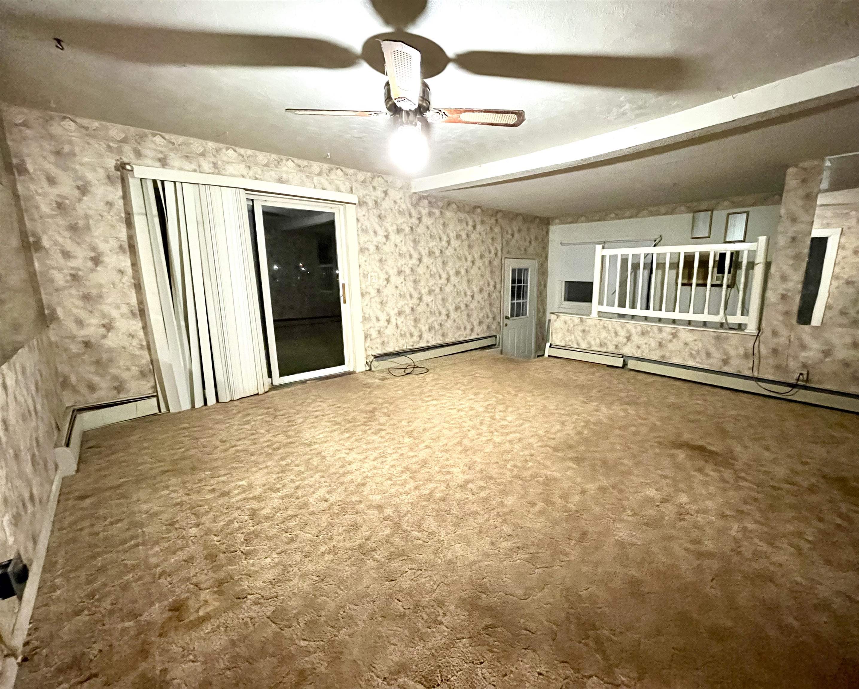 Living Room with basement stairway