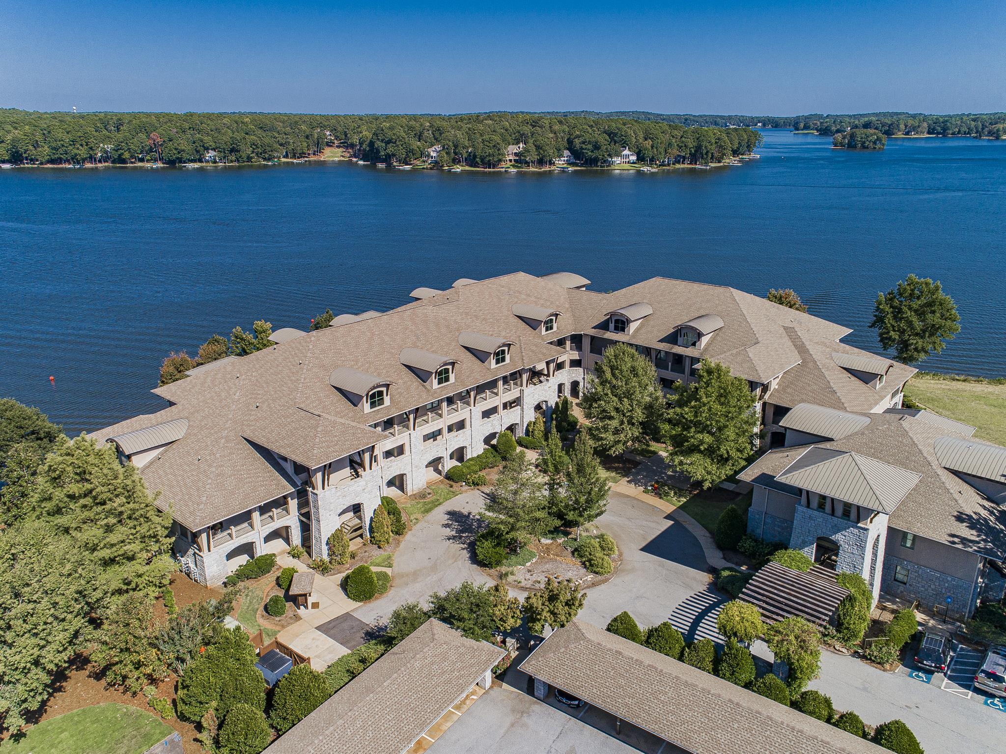 Easy Waterfront Living in Cuscowilla on Lake Oconee.  Enjoy true lock-and-leave convenience in this 3BR/3BA move-in ready lake front condo home in Sojourn.  Open floor plan with main lake views. Exceptionally maintained and updated unit. Wonderful Sojourn exclusive amenities, including:  Docks, Lakeside Sandy Beach, and Pavilion with Outdoor Kitchen overlooking Lake Oconee. Cuscowilla offers world-class amenities-- Lake Oconee’s only links-style course, brand new Clubhouse, restaurant, 2 pools, tennis, community garden, and more.  Sold partially furnished! Call today.