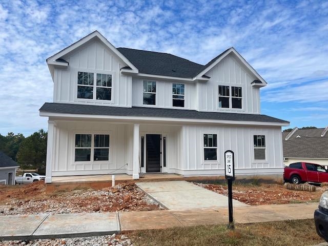 10K BUILDER INCENTIVE.  Buyer given choice on how to spend $10k, closing costs or upgrades.  A new plan in Carriage Ridge of Harbor Club by Oconee Capital Homes .  4 bedroom plus bonus room 3 bath home with master up and guest bedroom on main. Formal dining room connected to kitchen by butler's pantry.  Coffered ceiling in great room.  Spacious kitchen with large island.  Upstairs enjoy a spacious primary suite and three additional bedrooms with full bath. Beautiful trim detail through out.  Kitchen open to the dining room and great room.  Granite countertops, wood or LVP floors in all public areas. Tiled shower.  Landscape maintenance included in fees.  Harbor Club is Lake Oconee's best neighborhood with something to do for all.  Golf, pickle ball, tennis, lake, marina, swimming, fitness center, hiking trail, dog parks, community garden and two restaurants.  Come see for yourself!
