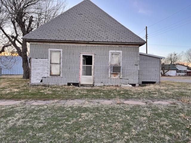 2 homes-in poor condition. Homes are 876 sf & 1017 sf. They have not been occupied for many years.  Multiple out buildings and a very nice quonset round top barn. It has concrete floor, is 70x20-built to store an RV and has an electric overhead door.