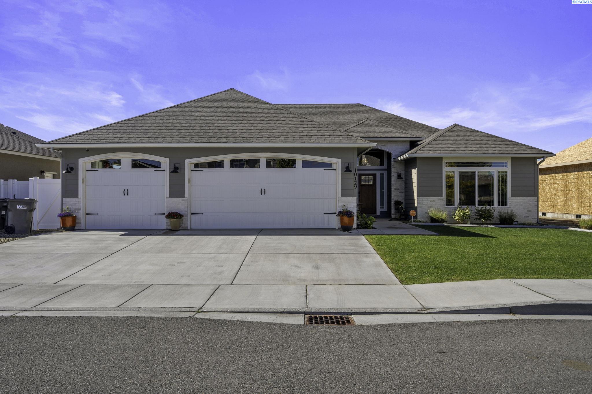 MLS# 275781 This like new 2020 built 1-level home offers everything you’ve been dreaming of, with all the upgrades! You will enjoy a wonderful open floor plan that offers 2050 sq ft of living space, a great room with fireplace, raised ceilings, and tons of natural light. The beautiful chef's kitchen features granite countertops, center island, stainless steel appliances, white cabinetry, huge pantry, and dining area. There are 4 bedrooms but one would make an amazing Den with all the built in cabinetry, and 2 bathrooms, including a lovely owner’s suite with a spacious closet and private bath. This immaculate home sits on a .21 acre lot with a large covered patio area to relax and entertain your guests, it also includes a hot tub and beautiful fruit trees and landscaping, along with a 3 car garage for all your storage needs. Located in a quiet neighborhood with nearby schools, parks and easy access to shopping and entertainment. This is a fabulous opportunity to purchase an almost new home with out the wait of a new build!