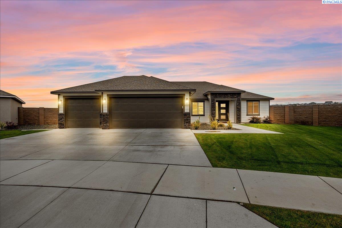 MLS# 287445 Welcome to this stunning 2023-built rambler, tucked away in a quiet, well-kept cul-de-sac on a spacious 0.36-acre lot. Better than new, this home is packed with thoughtful upgrades and timeless finishes.Inside, you’ll find 4 bedrooms, 2 bathrooms, and an open-concept layout with a split-bedroom design. The main living spaces feature LVP flooring, soaring ceilings with an exposed beam, and abundant natural light. The gourmet kitchen boasts oversized cabinetry, quartz countertops, a full-height backsplash, built-in appliances, and a large island perfect for entertaining. The primary suite offers a retreat of its own with a spa-inspired bath, including dual vanities, a soaking tub, a beautifully tiled shower, and a generous walk-in closet. The additional bedrooms are spacious and versatile, while the oversized laundry room provides extra storage and a folding station with quartz counters. Step outside to a backyard built for enjoyment—featuring a custom dog door, an expansive concrete patio stretching the length of the home, a covered patio area, full block fencing with a custom iron gate, and professional landscaping.The fully finished 3-car garage includes a sink and a convenient man door to the backyard. With every upgrade thoughtfully chosen, this home truly has it all. Don’t miss your chance to own this move-in ready gem!Seller is a licensed Realtor in WA.