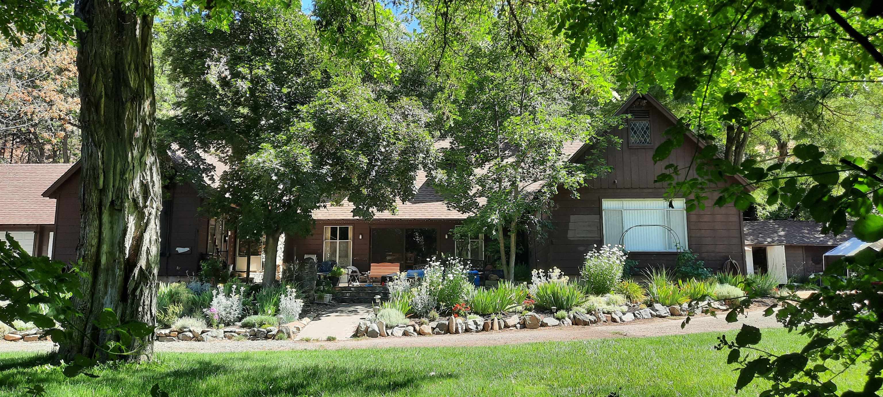 Continue the legacy of the original Beaver Creek Lodge along the banks of the Klamath River. Located only 17 miles off Interstate 5 in NorCal, a private, gated, and beautifully landscaped oasis is waiting for you to act on your dream of  residing and generating income on the same property! The historic lodge and 6 adorable, turn key (and furnished) cabins are easy to fall in love with. Highway Commercial Zoning allows for multiple uses. The current owner has invested a considerable amount into electrical, on demand h/w, retaining walls, irrigation systems & landscaping, heating systems, appliances, flooring, and more! There are great outbuildings for storage and projects, an old drift boat launch, and more blackberries than you can eat. The river has excellent fishing for steelhead, trout, and has a fall run of salmon.