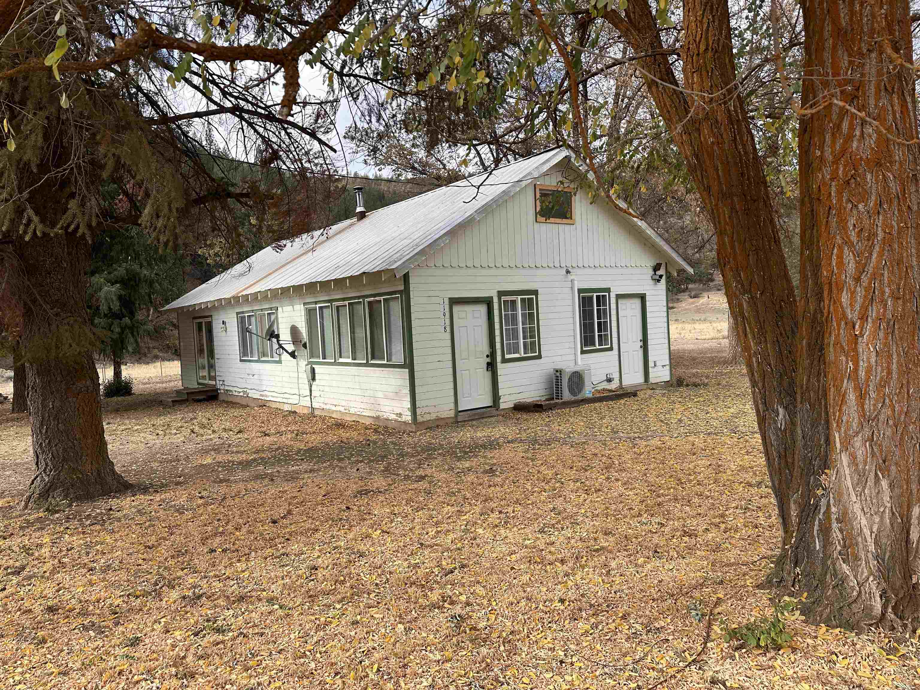 80 Acres in the Moffit Creek drainage Fort Jones CA Large pastures with an old mill barn, quaint 3-bedroom 1 bath farmhouse, mini split with a wood stove, Mud room, newer Vinyl windows, metal roof, most of the ground is pastures, seasonal creeks and a shared well
