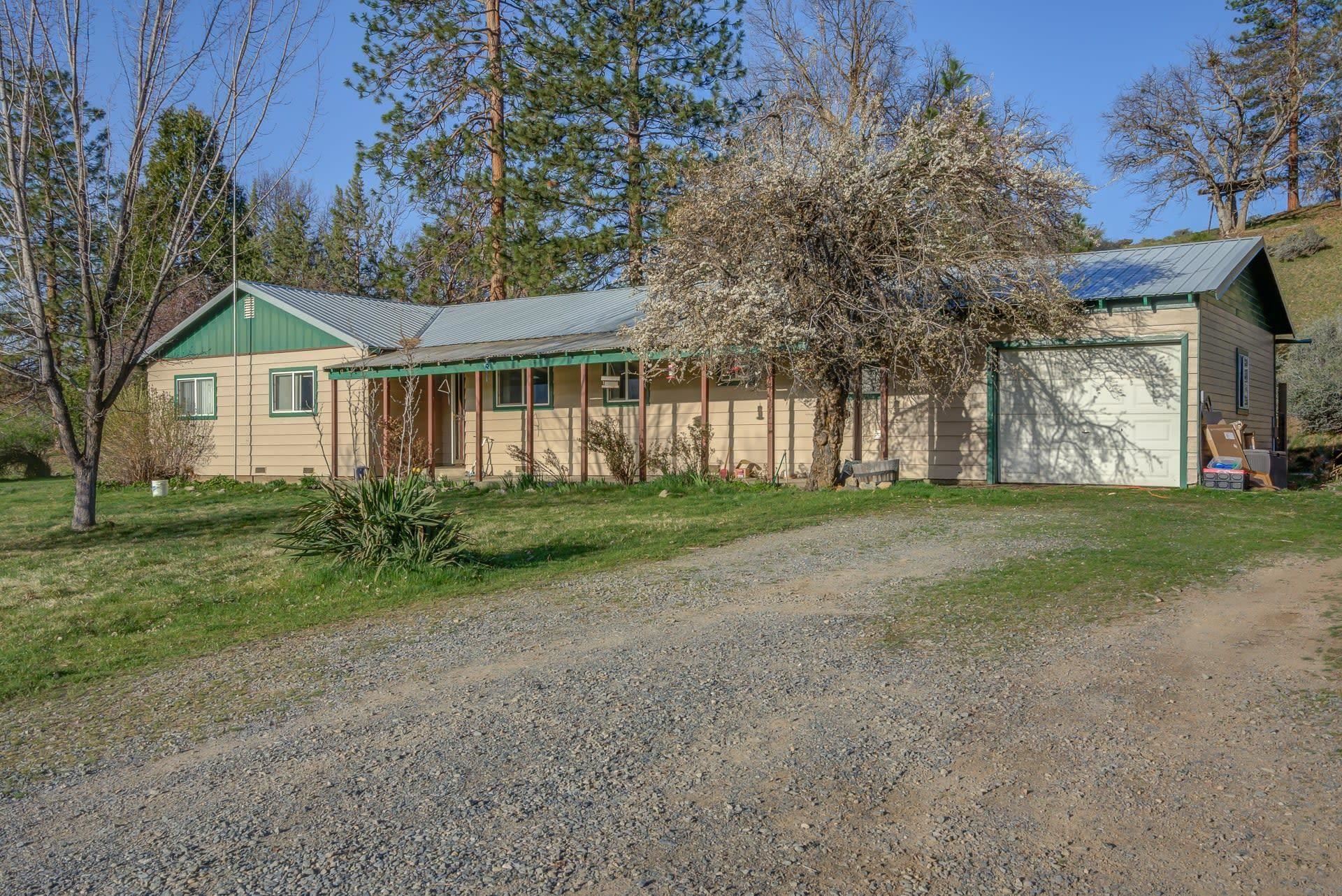 GREAT SMALL RANCH WITH EXCELLENT LOCATION IN SCOTT VALLEY! Beautiful views…you can even see the top of Mt. Shasta & seasonal McAdams Creek runs thru the property. Prime setting off a paved road that’s only minutes from Yreka & Fort Jones. Welcoming FARMHOUSE has 3 Bedrooms, 2.5 Baths, a large kitchen with pantry area and a formal dining room. Central heat and air plus a wood stove with slate hearth make this home cozy & comfortable. You’ve got to see this fabulous property with its rustic barn, shop, storage shed, small orchard, and loads of wildlife...deer & quail galore! 53.85 Acres: 35 acres tillable, 22 currently in production with an additional 15 acres of wooded hillside. Per Seller there are four wells: l domestic & 3 ag. NOTE: The information provided is deemed reliable but is not guaranteed, is subject to change and should be independently verified.