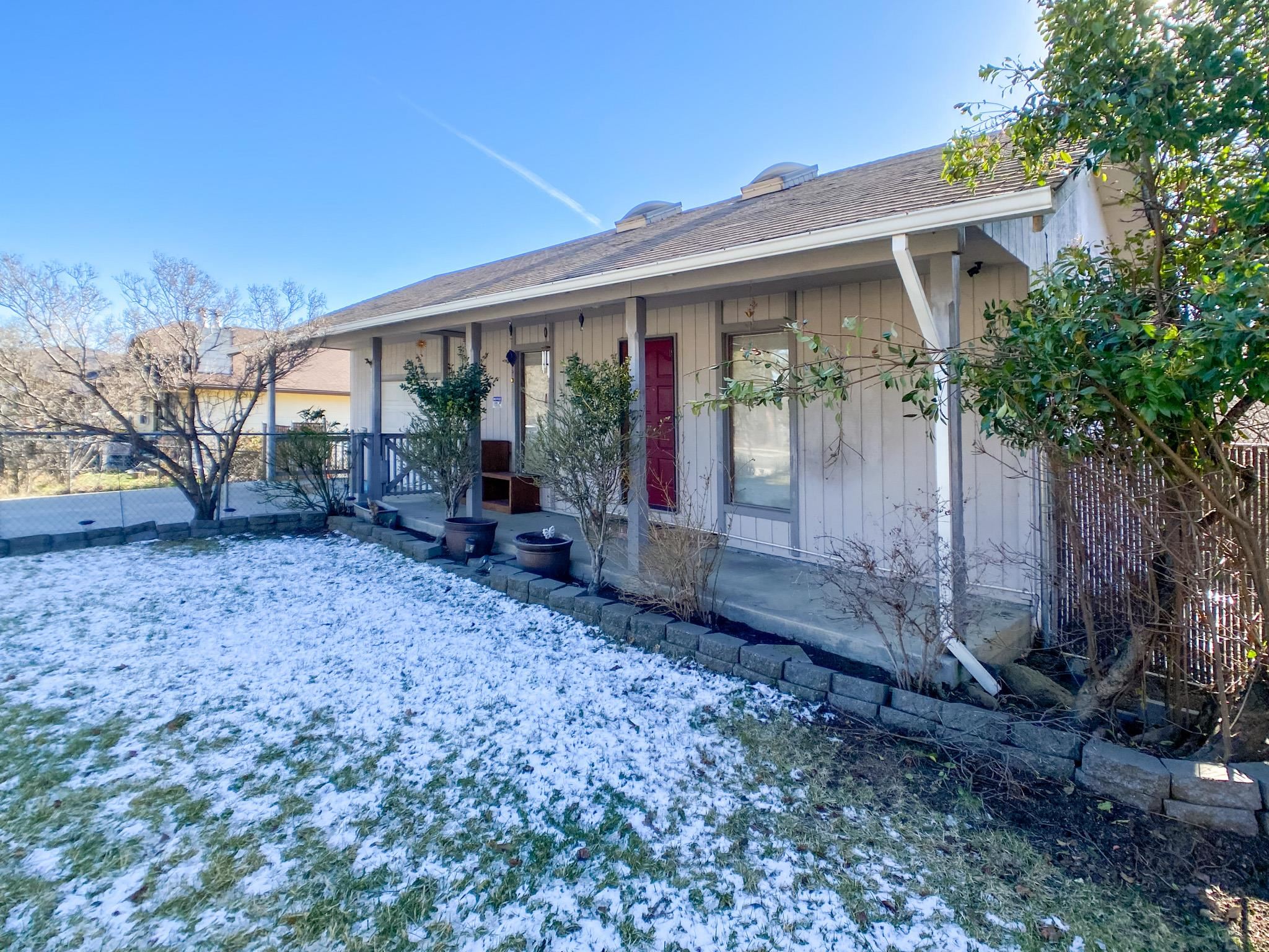 Roomy 2 story home at the top of Lane Street in Yreka, CA! Beautiful views of Mount Shasta from inside and the large wrap around deck. Open floor plan with vaulted ceilings and skylights. Two bedrooms, extra large utility room, bathroom, and extra family room down stairs. Spacious kitchen, dinning room, living room, bathroom, and 2 bedrooms, one with access to the deck and hot tub are upstairs. Central heat and air, plus monitor heater. Fenced back yard with storage shed and gated entry from front and back to park an RV, boat or other recreational vehicles. Fenced and landscaped front yard. Active security system goes with the property.