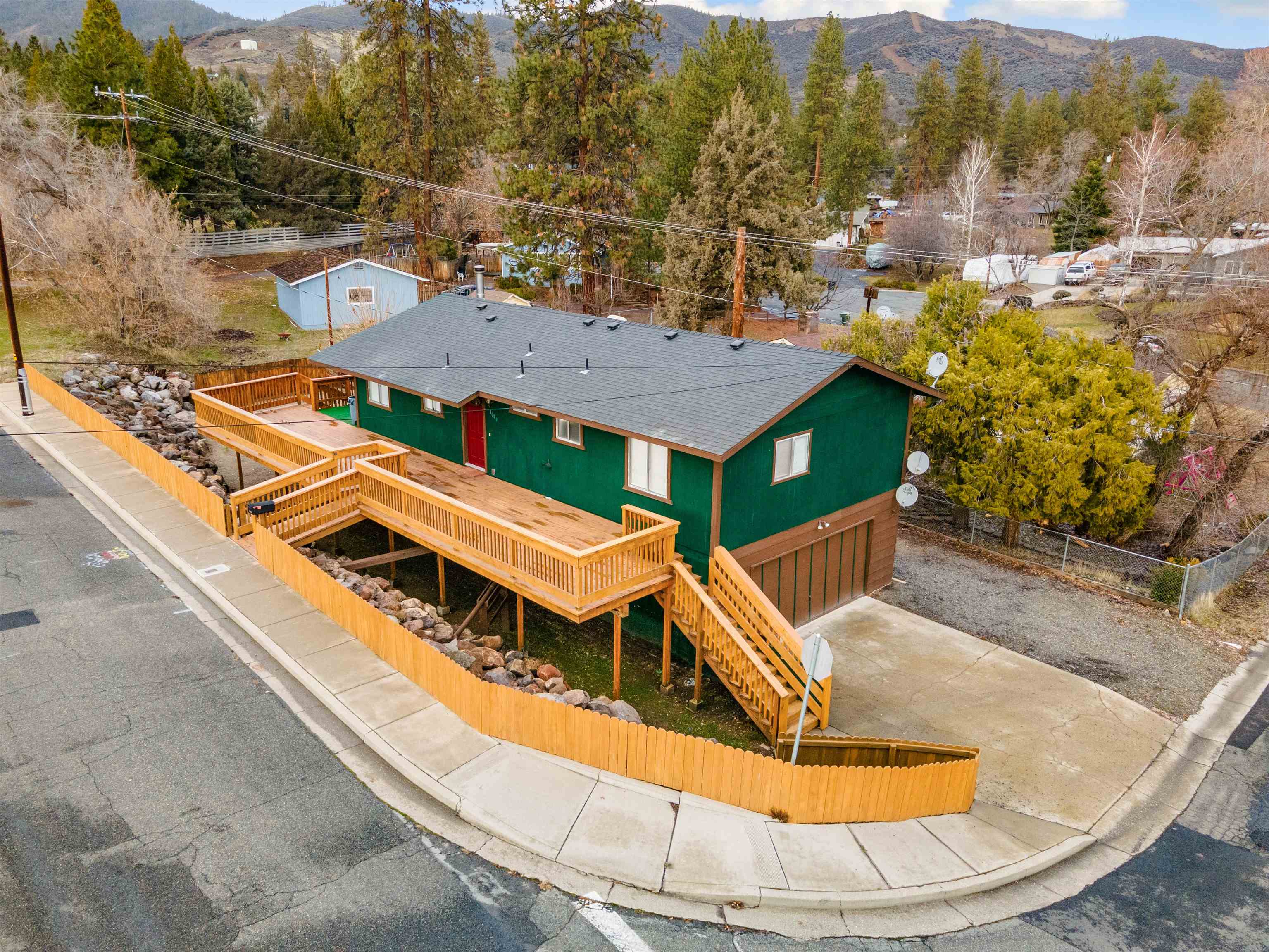 Newly refinished large deck with views of sunsets across the west mountains, makes this a very attractive outdoor space in this renovated Yreka Home! Recently updated throughout, butcher block counter tops in the kitchen, new cabinets, new bathrooms, fresh paint, new flooring makes this a bright and inviting place to call home! 3/2 1652 sqft includes a remodeled lower level that could be perfect for entertainment space or another living room! Located 1/2 a mile from historic downtown shopping and dining, close to schools. Easy to maintain fenced yard and great garage access on this corner lot! Motivated seller! Schedule a tour today!  The accuracy of the information provided is deemed reliable but is not guaranteed, buyer to verify all information provided.
