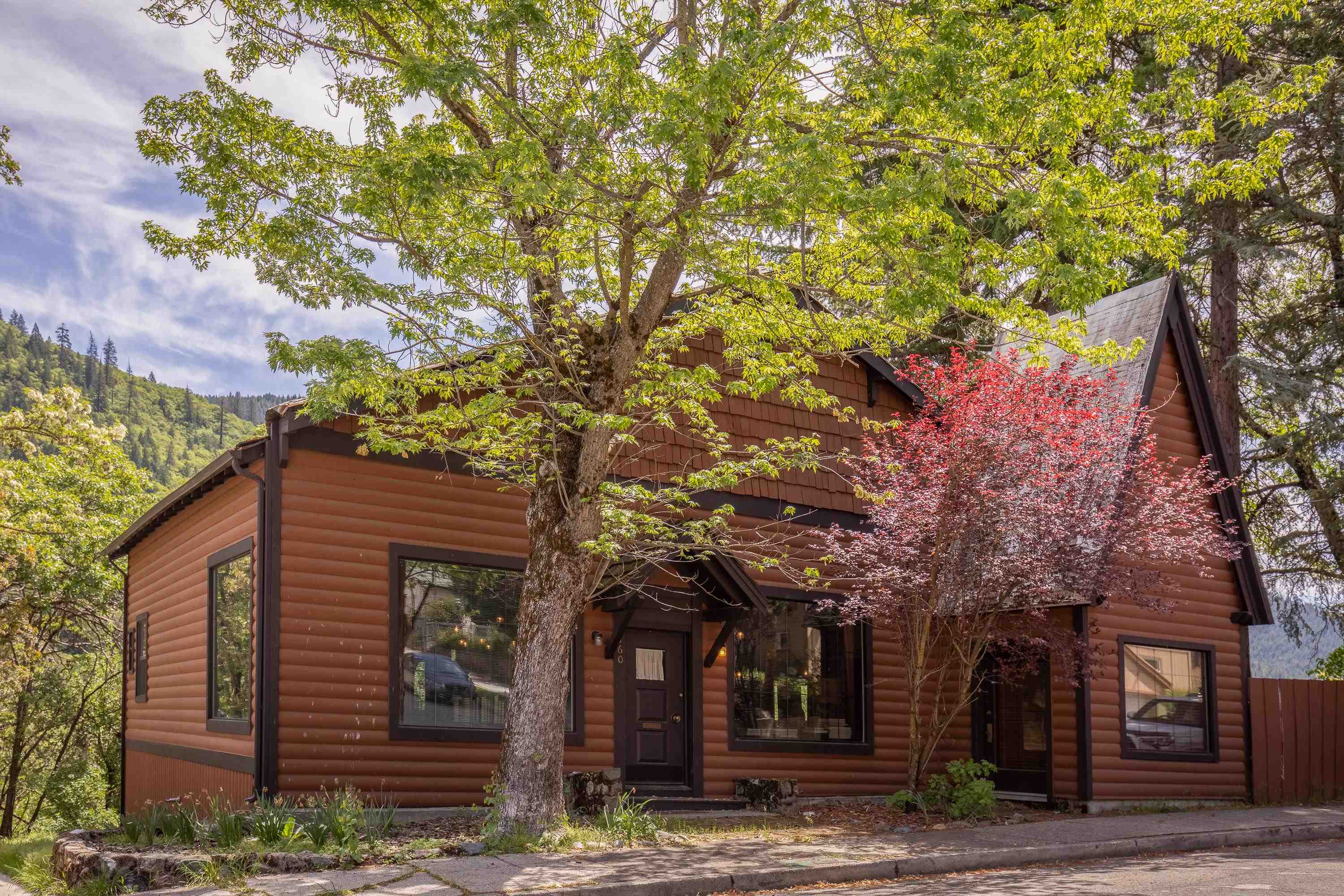 Licensed Vacation Rental - Available now - This historic, unique and no doubt one-of-a-kind property is now up for sale.  Fully furnished with an active vacation rental, look no further, here is your opportunity to own a property like no other.  Featuring 4 bedrooms (sleeps 11) and 3 bathrooms and over 3500 square feet of living space.  In the basement there is a plethora of storage, as well as two washers & dryers.   Electric has recently been updated, as well as all the lighting to LED. There is a large deck to enjoy the summer evenings or watch the winter snow fall from the big picture windows. A recent movie was also filmed here, so even more to share with regards to the history this home offers.   Call for your private tour today!