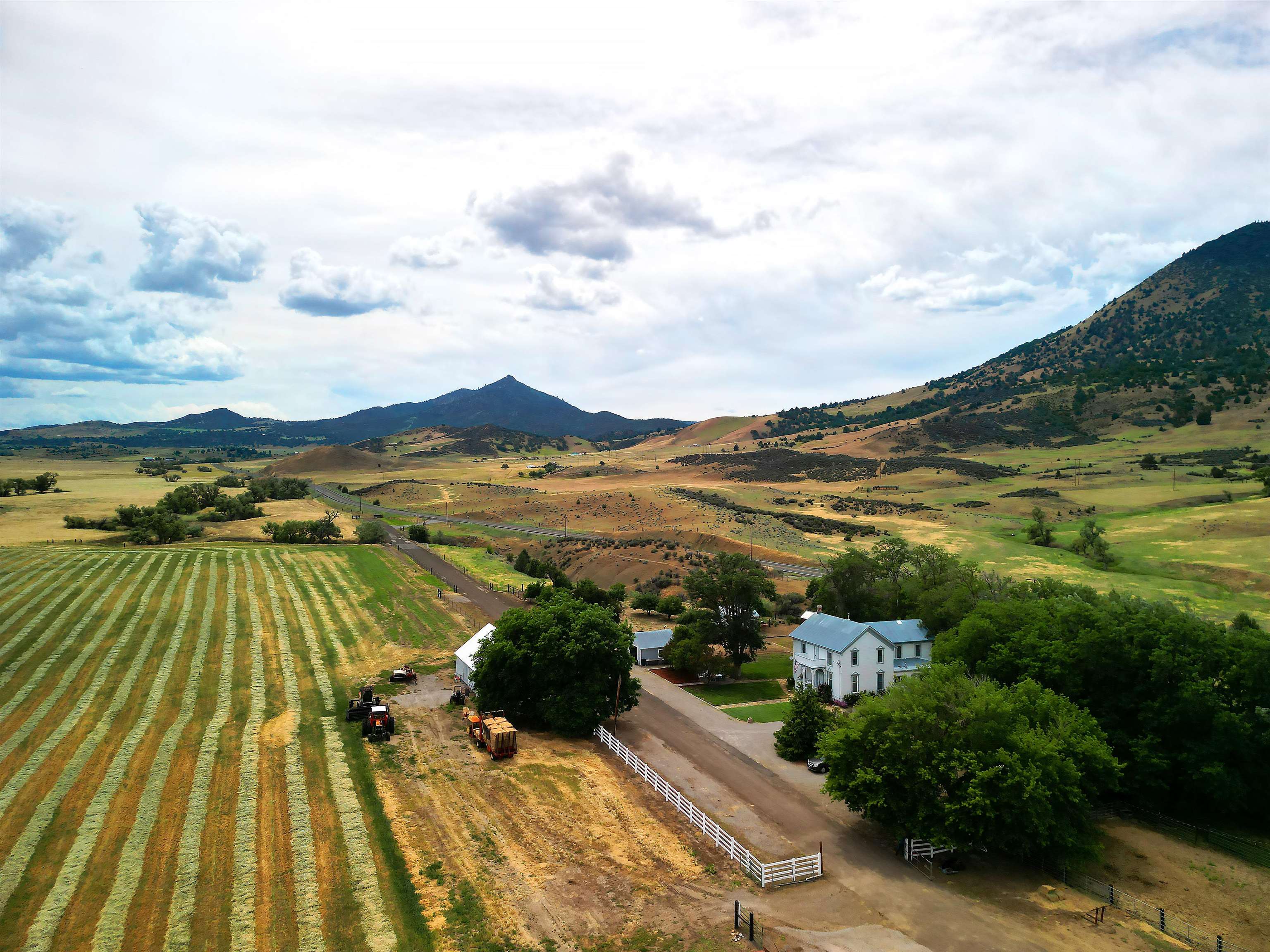 BACK ON MARKET!  Historic Ager Ranch of 166+ acres, open farm ground with hay production, pastures, fenced and cross fenced; 2 barns w/power; 80'x45' pole barn with 20'x80' attached lean-to for hay storage and feeding; 16x20 shop with power and water. Corrals, round pen, chicken house and more. All set off by original 1883 Ranch house restored to incredible charm still keeping its elegant beauty of the past: 10' ceilings, custom vinyl windows; central diesel heat and cooling; beautiful original hardwood floors and nostalgic wainscoting; kitchen, laundry and porch with custom cabinets; large bedrooms, lots of storage; built-in bookcases and crown molding in master; replumbed and rewired in 2002;F/A diesel and AC;  monitor heat as back up; laminate floors in family room, carpet in bedrooms.  Unfinished basement is 459 sq ft and provides great storage.  Just 20 minutes to Yreka and 30 minutes to Ashland, OR.