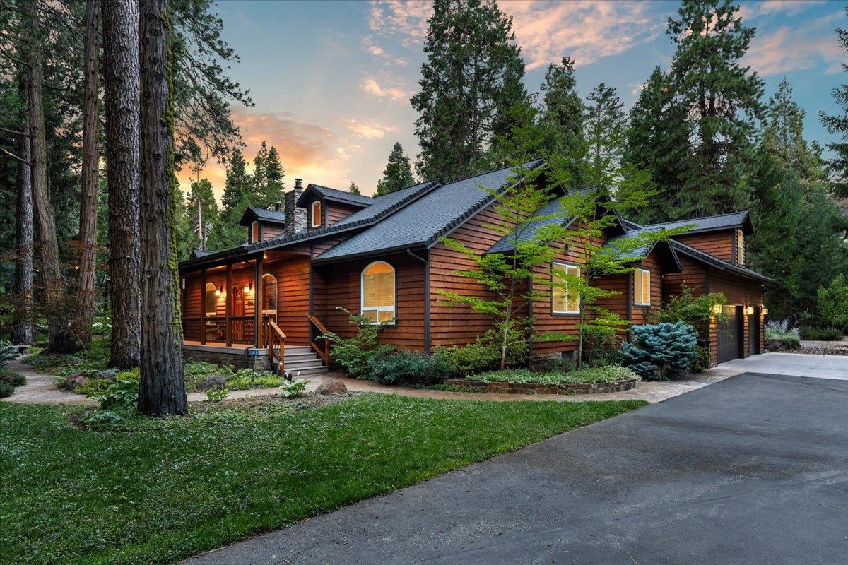 Nestled in the highly sought-after Timber Hills subdivision in Mount Shasta, California, is an exquisite 5-bedroom, 5-bath home that offers a luxurious and tranquil living experience. This stunning property combines modern elegance with the serene beauty of its natural surroundings, making it a dream home for those seeking both comfort and a connection with nature. As you enter this remarkable home, you are greeted by a grand foyer with high ceilings and an abundance of natural light. The open concept design seamlessly blends the living, dining, and kitchen areas, creating a spacious and inviting atmosphere. The living room boasts a cozy fireplace, perfect for gathering with family and friends during chilly evenings.Don't miss the chance to make this dream home your own.