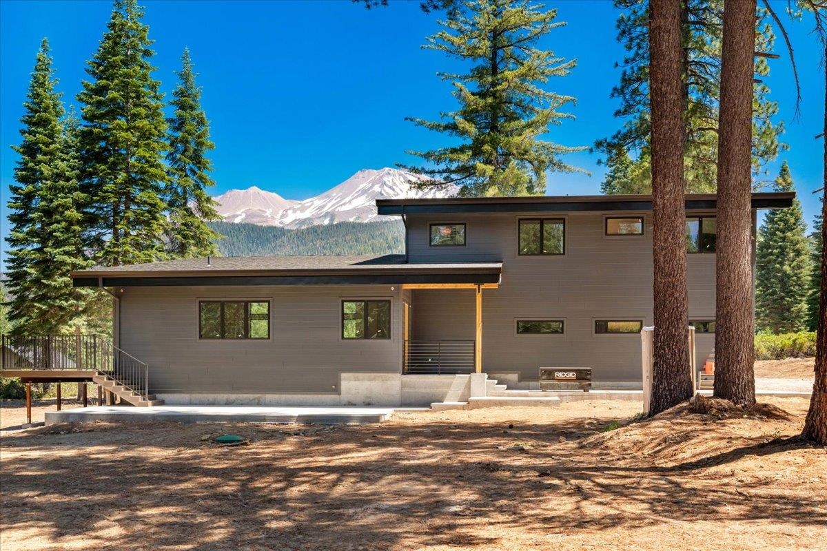 WHERE MODERN MEETS THE MOUNTIAN...This gorgeous, 2400sqft, 4 bedroom, 2.5 bath, newly constructed home sits on 2.80 acres in the highly desirable Cold Creek subdivision. Designed to take full advantage of the views of Mt Shasta. The modern designed open concept living area features floor to ceiling windows. The sleek, state of the art kitchen design is both functional and beautiful. A guest bath, pantry and laundry room are also located on the main floor. Upstairs is where you will find the primary bedroom suite complete with its luxury appointed bathroom, a huge walk-in closet & gorgeous mountain view. There are 2 additional spacious bedrooms and a bonus room that can be used as an additional bedroom, media room, library, office, etc. Other features include an attached 3-car garage and a wraparound deck that allows for extra outdoor living space. Low maintenance landscaping is in place and the driveway is freshly paved. Call today to schedule your private showing.