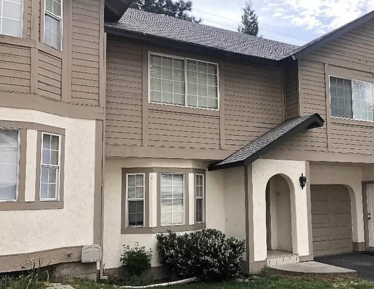 Beautiful Townhouse located within walking distance of downtown, schools, restaurants, bars, and coffee shops. Only a few miles from hikes, lakes, and many other outdoor activities. This 2 bedroom 1.5 bath features brand new flooring throughout the entire unit, as well as a top to bottom remodel of the restroom. This unit has been updated and remodeled to have a clean and sleek look. This property's HOA covers the cost of exterior yard maintenance, paint and siding maintenance, roofing repair, trash, and even snow removal! There is laundry in unit with a very quiet and friendly neighborhood. There is also a covered and enclosed carport detached from the unit as well.