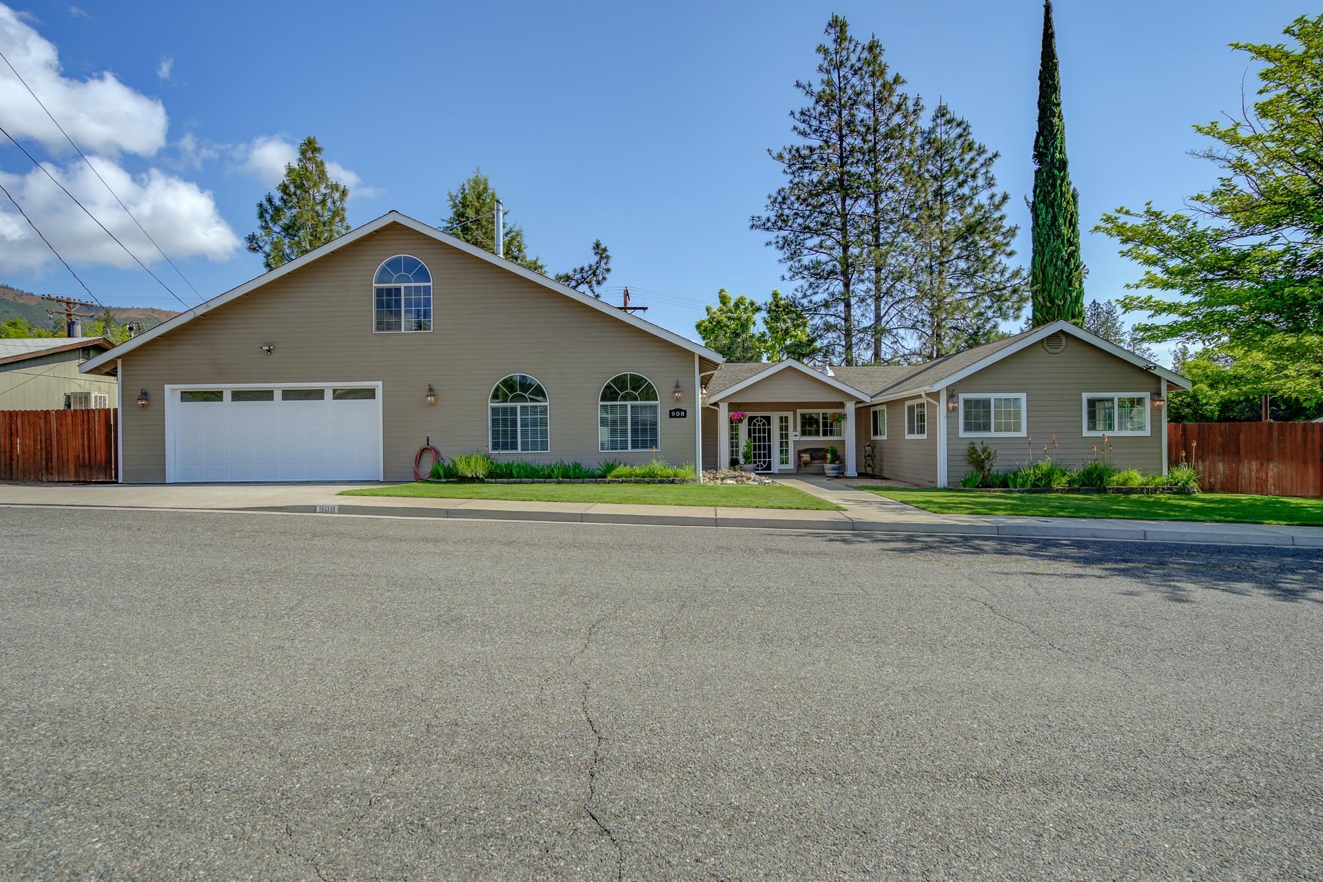 DON'T MISS THIS FANTASTIC MOVE-IN READY HOME! Curb appeal and functionality in one gorgeous home in a great Yreka neighborhood!  Open floor plan is an entertainer's dream.  There is a great kitchen with lots of counter space and a large island! This home boasts 4 bedrooms, and 2 bathrooms and the office can even house a 5th bedroom! Beautiful tilework and the home is impeccably maintained. Stay warm with an efficient monitor heater or enjoy the wood warmth from the cozy and beautiful wood stove. Venting throughout the home allows for the evaporative cooler to keep this large home cool in the hot summer months! Large attached 2 car garage with built in hobby room provides ample space and opportunities. Low maintenance backyard with a large patio and a climbing wall for those with abundant energy! The private backyard is ready for a new lawn or a vegetable garden and the large deck provides plenty of space for outdoor entertaining! Hardie board siding provides durability and fire resistance. Pride in ownership shines through in this property.  This home should qualify for all government loan programs. Make an appointment to view this home today!