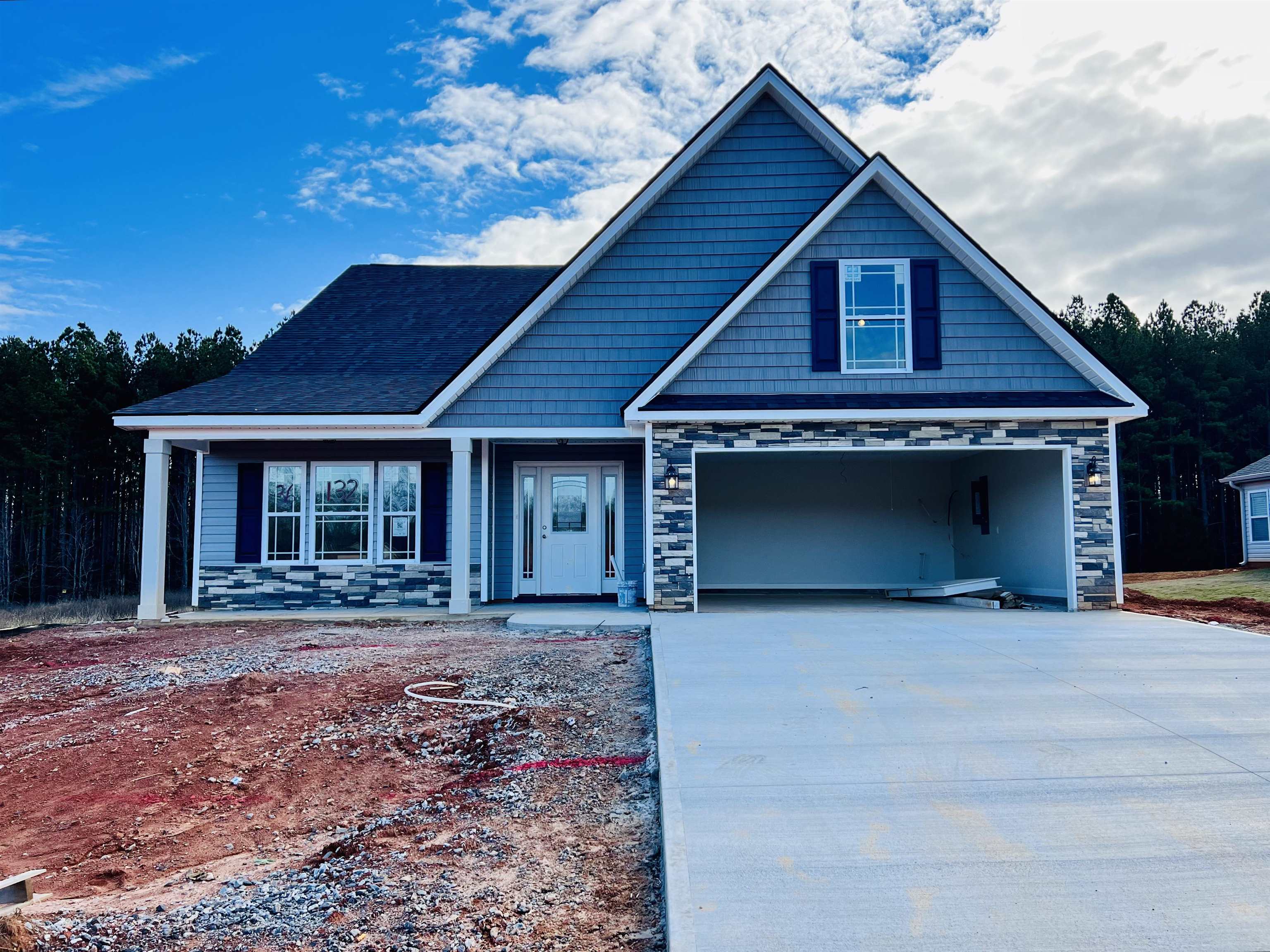 Preferred Lender/Attorney Closing Costs Incentive Offered!  Welcome to Double Creek! The Addington plan offers a beautiful, modern layout. Spacious kitchen and formal dining. Home complete with the trademark chair rail, crown molding, and rope lighting.