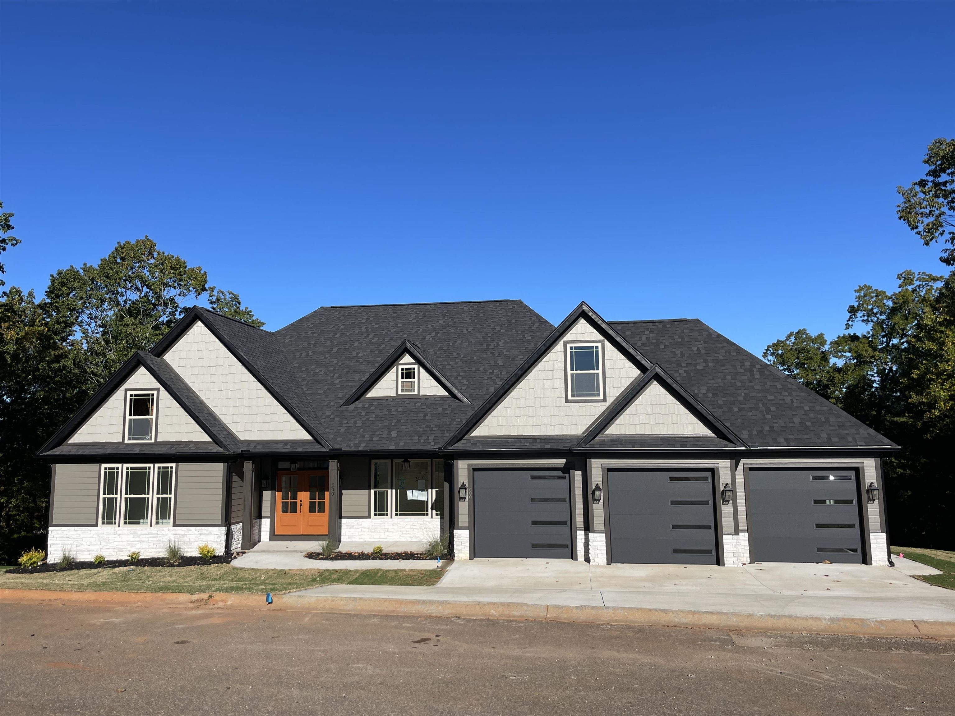 Beautiful views of the Blue Ridge mountains are calling you to Pointe Summit! A new 96-acre luxury, gated community with large Lots and spectacular mountain views! It’s an easy drive to downtown Greenville AND Hendersonville. The Converse Elite floor plan is an open concept home featuring 3 bedrooms, 2.5 bathrooms, study, walk-in pantry, and large kitchen with extended cabinets & island. Standard features in this home and in the community include concrete plank and stone exterior, architectural shingles, soffit exterior lighting, nine to 11 foot ceilings, crown molding with rope lighting in the master and living room, large tiled shower in the master bathroom, 80 gallon water heater, large covered back deck and more! Make one of many homes available in this community yours! Lot 39