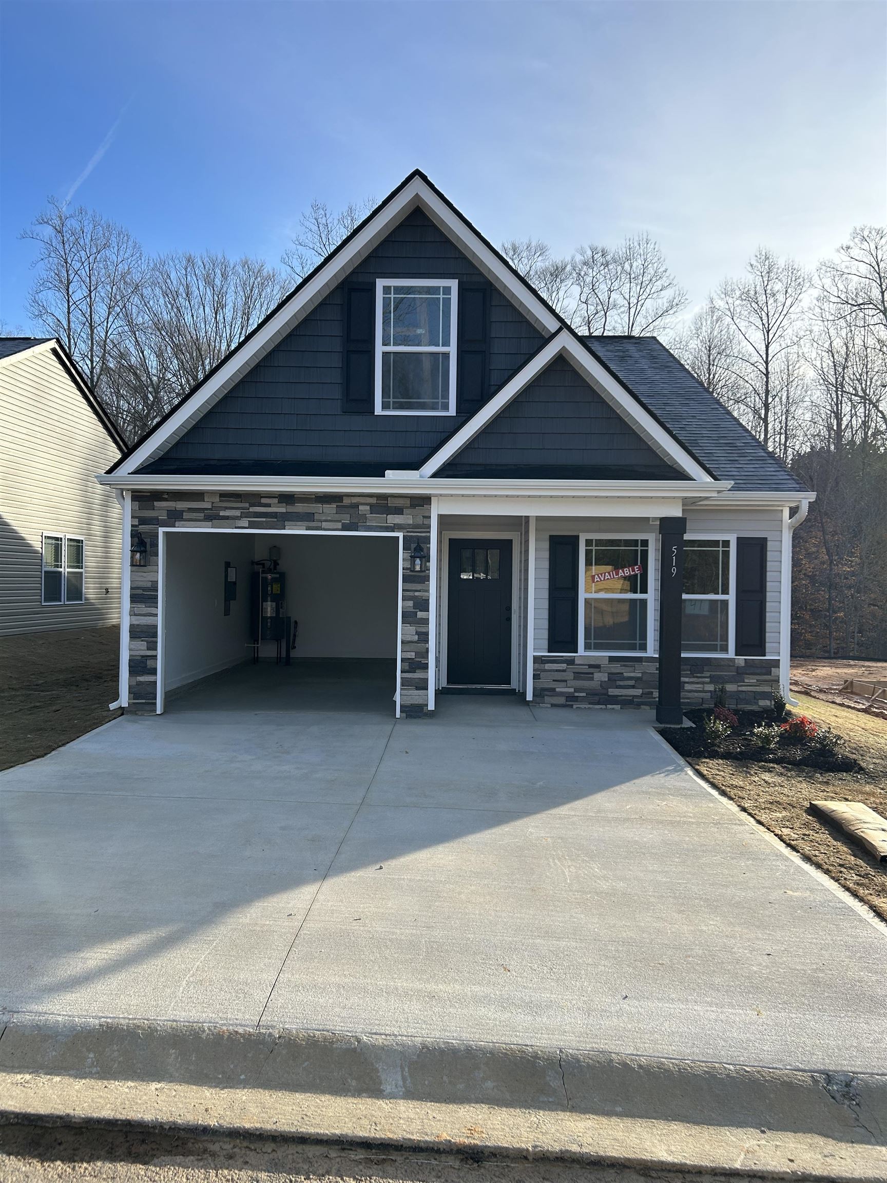 Inman plan - 1165 SF - 2 BR/ 2 BA home with a one car garage. Tall ceilings in the open living area. Kitchen features a large island, custom quartz countertops and Marsh cabinets. A covered back patio is great for entertaining. Lot 41. Home ready to close in early 2023.