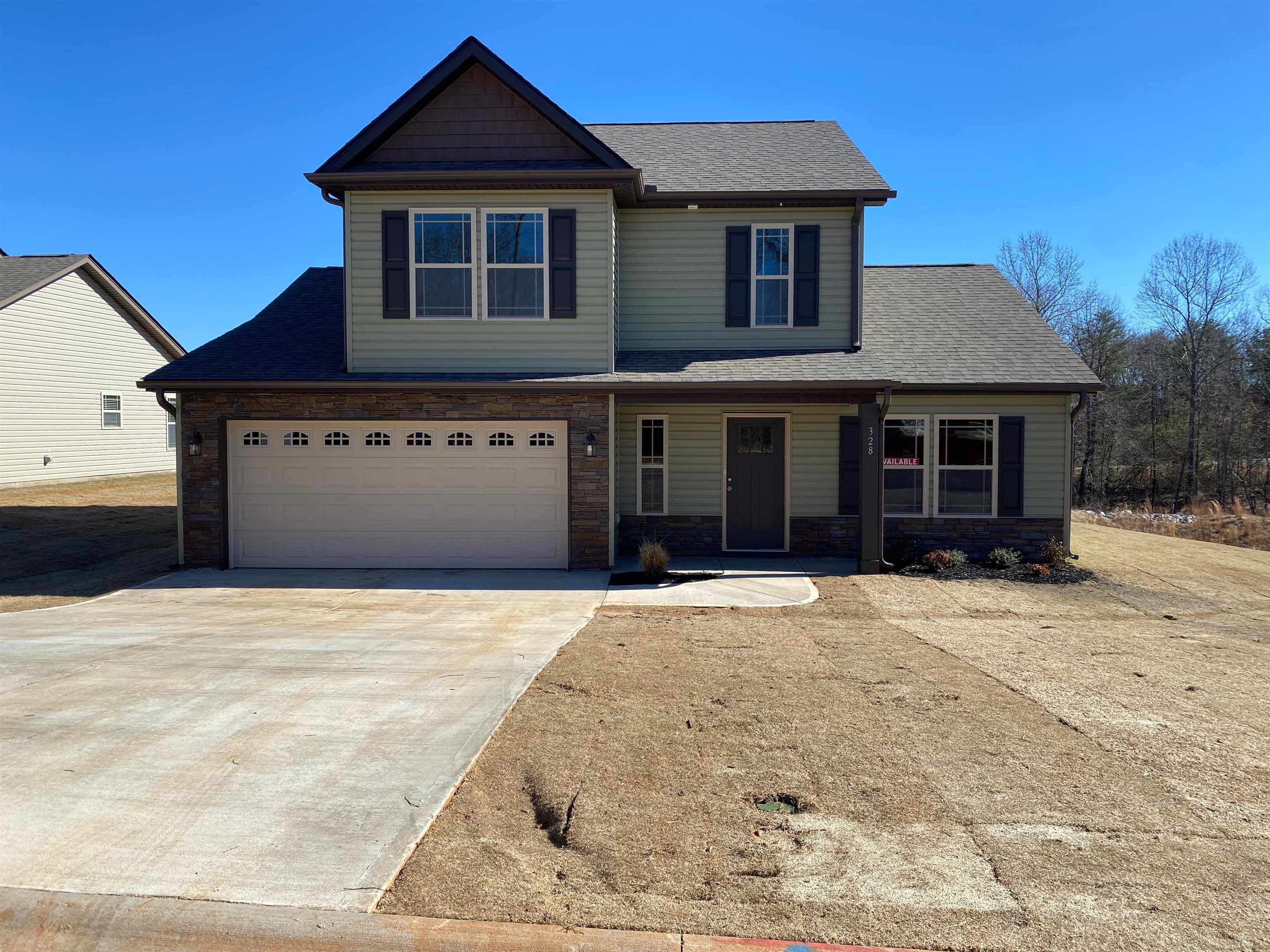This home features 3 bedrooms PLUS a bonus room. The cozy living area features a gas log fireplace and is open into the kitchen/dining space. Out back is a large covered patio overlooking the huge yard. Lot 20. Preferred Lender/Attorney Closing Costs Incentive Offered!