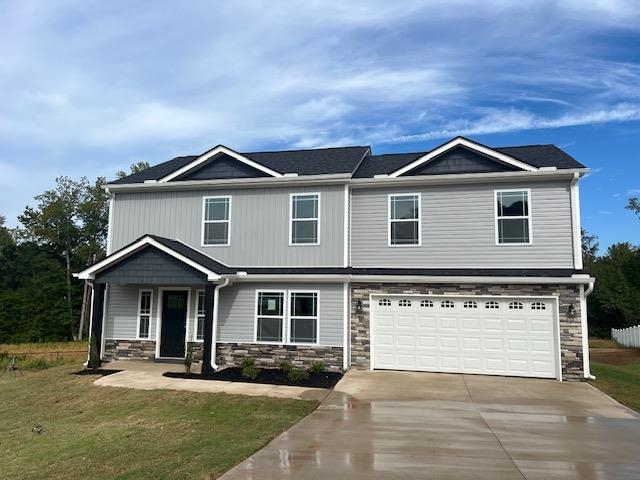 MOVE IN READY!! Local Builder with quality workmanship at Shands Park. Great location, close to Wellford, Lyman, Greer, Inman and Spartanburg! Custom Plan. Two (2) Bedrooms plus an office AND a loft area. Extra wide covered patio. Granite countertops. Luxury Vinyl Plank upgrade on 1st level and all wet areas. Painted cabinets throughout home. No future home next door (adjacent to retention pond). Culdesac Lot. Must See! Lot 14 - Customized Roebuck Plan