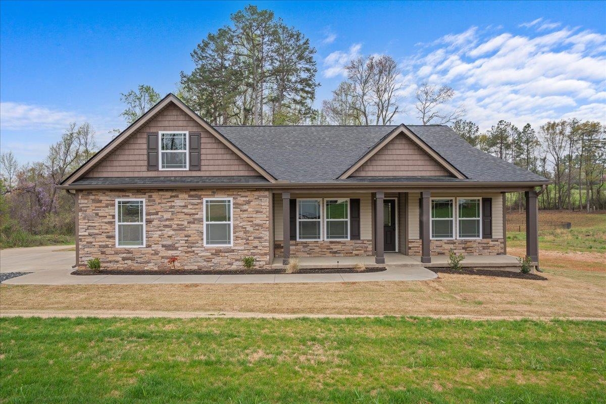 Move in ready! Welcome to the Brentwood floor plan. This single story plan has four-bedrooms and two-bathrooms. Features include Luxury vinyl plank flooring, granite countertops throughout, corner fireplace in the living room, trey ceilings with rope lighting, covered back patio, and much more! With meticulous attention to detail throughout, this home offers the perfect blend of comfort and luxury. Call today for more info!