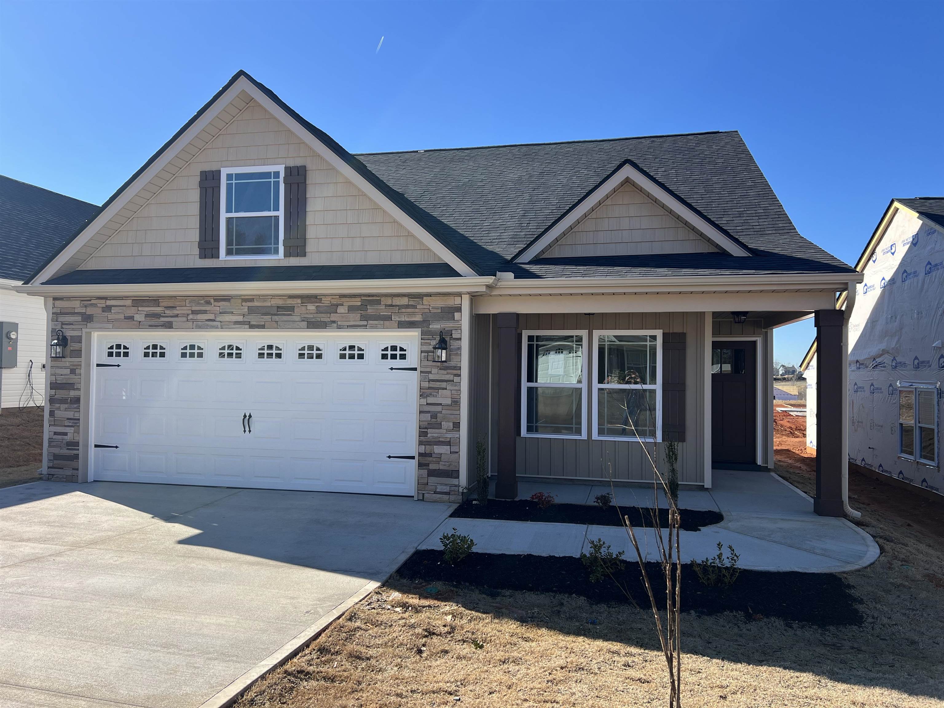 The CLIFTON plan (Lot 71) has a spacious open living area and split bedrooms. Granite countertops, crown molding with rope lighting, and many more features included. Large 14x21 FROG room with walk-in closet can easily 4th bedroom or extra living space. 12x12 covered back patio. 30-year architectural shingles, site-built construction, and a 10 year limited warranty are included to give you peace of mind.  Closing cost or upgrade incentives available when working with preferred lender and attorney!! *Virtual tour reflects same house plan, not exact house.