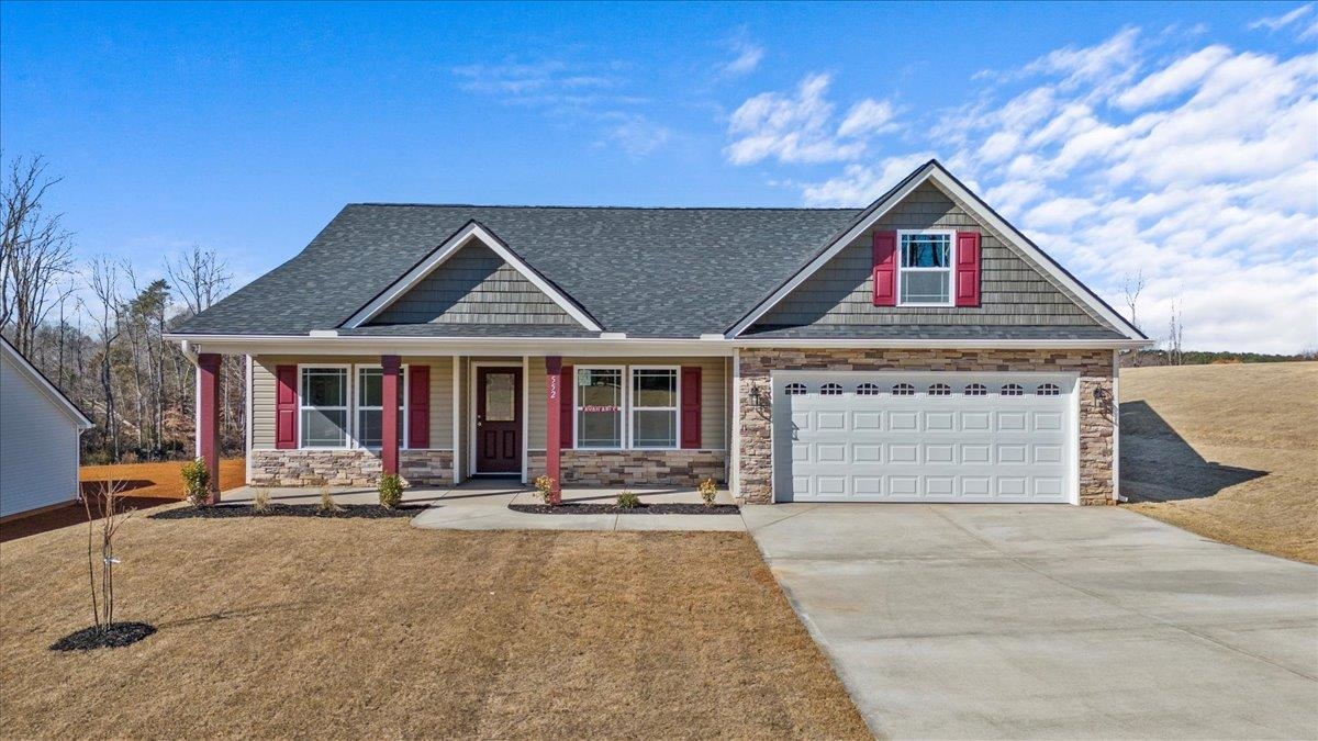The BRENTWOOD plan with covered patio & mudroom. Large open living space which includes an office/study, combined kitchen and dining area, large laundry room, and plenty of closet space. The standard features include 8- 10 ft ceilings, with rope lighting in the living area and Master bedroom, solid countertops, and painted cabinets.   Lot 59