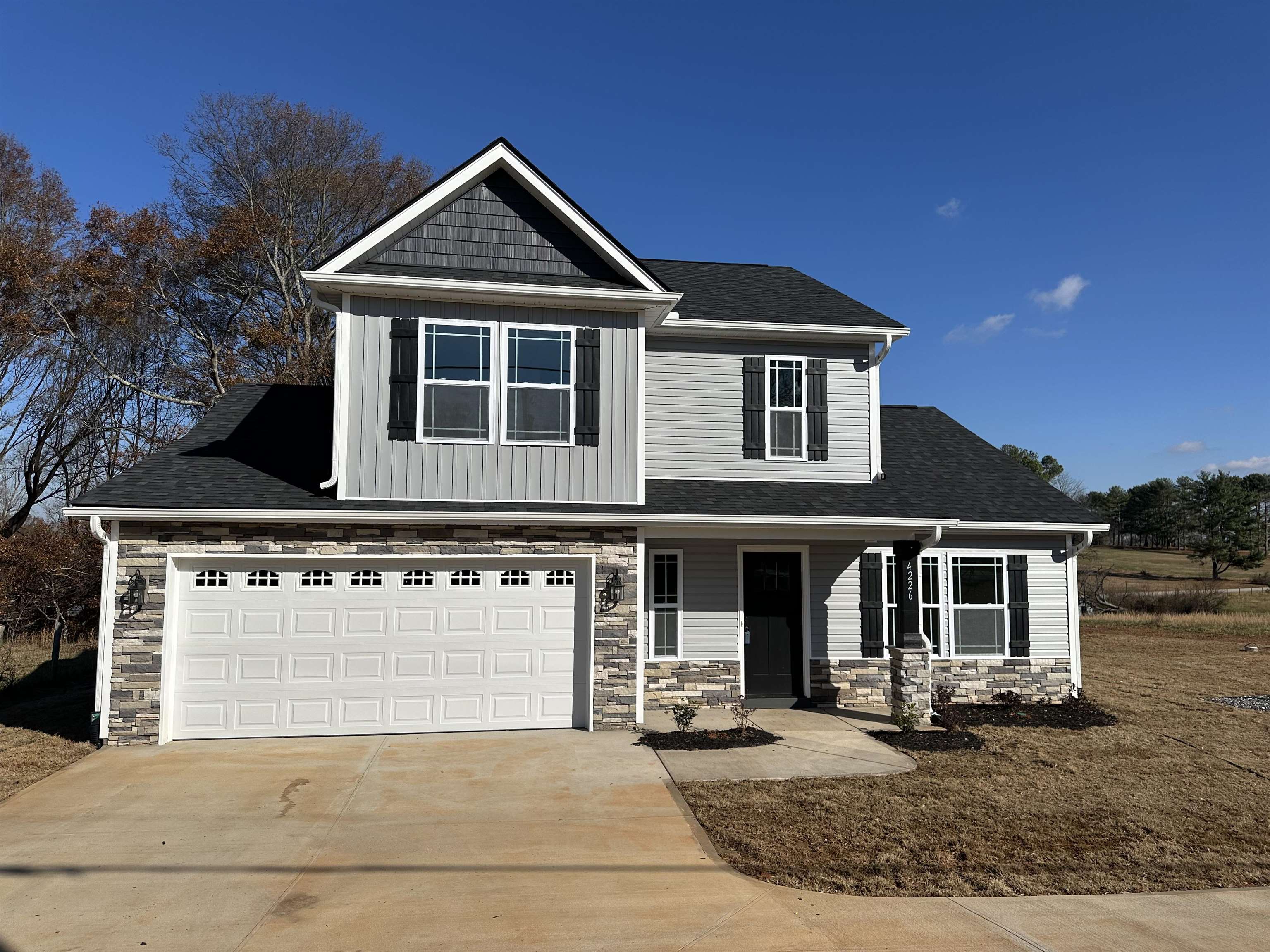 Local Builder with quality workmanship. The Sumter plan offers a grand entrance with 2 story entry way! Open floor plan with Master on Main! 2 bedrooms on second level, along with a loft open to the entry way on first level. Granite countertops. Craftsman siding package, including board & batten, stone around garage, stone columns and craftsman shutters. Painted cabinets and full stone fireplace! Conveniently located to both Spartanburg and Greenville. Must See! Sumter Plan  *Virtual tour reflects same house plan, not exact house.