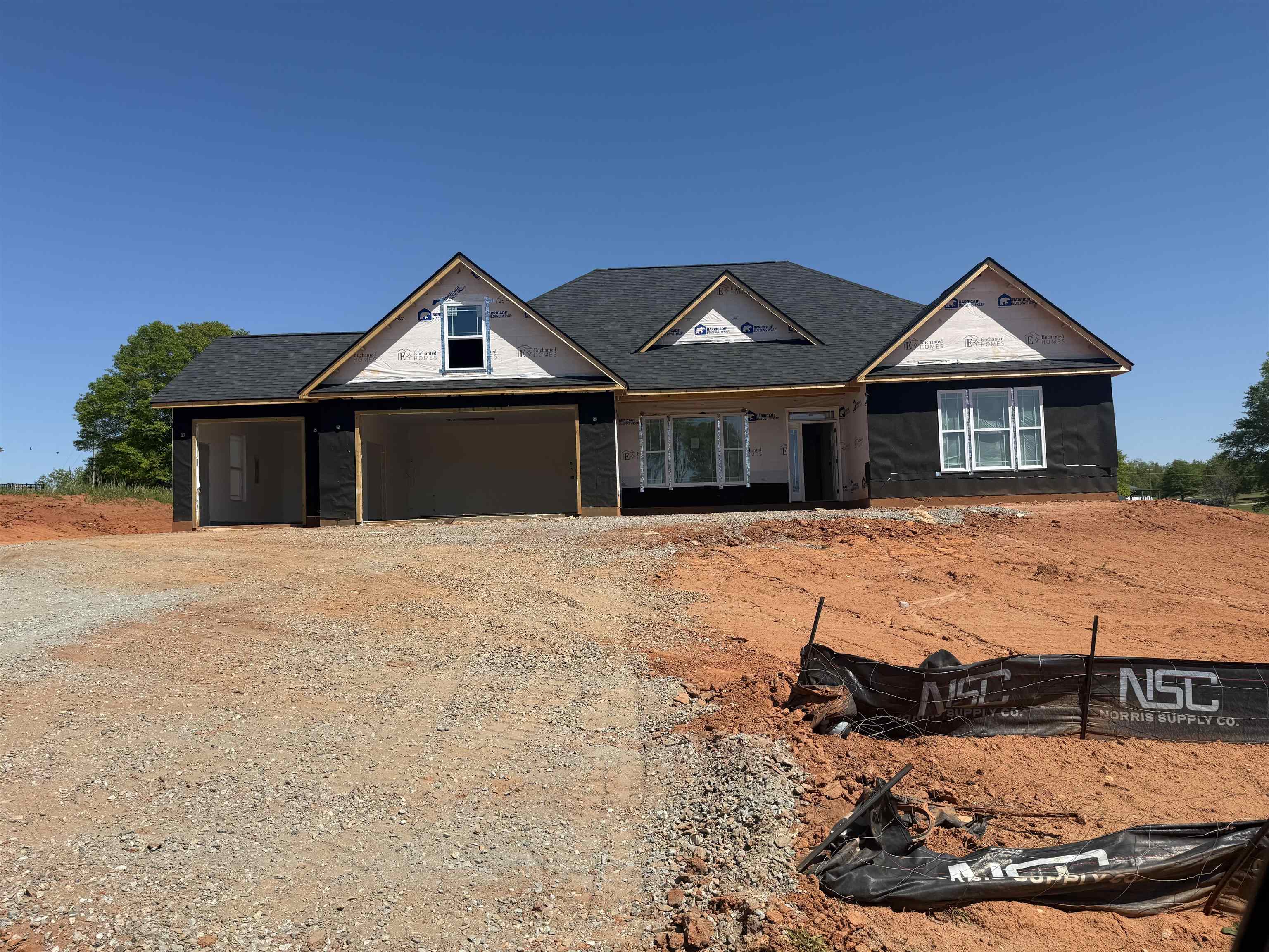 Welcome to your dream home! This beautiful new construction on a large 1 acre lot, is situated in the picturesque town of Inman, South Carolina, offering breathtaking mountain views that will leave you in awe.   Step inside and you're greeted by a spacious entryway with trey ceiling that leads into a large living space with gas fireplace. You'll love the bright and inviting sunroom, perfect for enjoying your morning coffee or relaxing with a book. The open floor plan seamlessly flows into the gourmet kitchen, featuring stunning granite countertops and stainless steel appliances. The cement board siding adds durability and low maintenance to your home.  The luxurious master suite is a true oasis, featuring a fully tiled shower with dual shower heads, making every morning feel like a trip to the spa. The additional bedrooms are generously sized and offer ample closet space.  This home boasts impeccable attention to detail and craftsmanship, ensuring quality and longevity for years to come. Don't miss the opportunity to call this stunning home yours and enjoy the peacefulness and serenity that Inman has to offer. Schedule your private showing today!