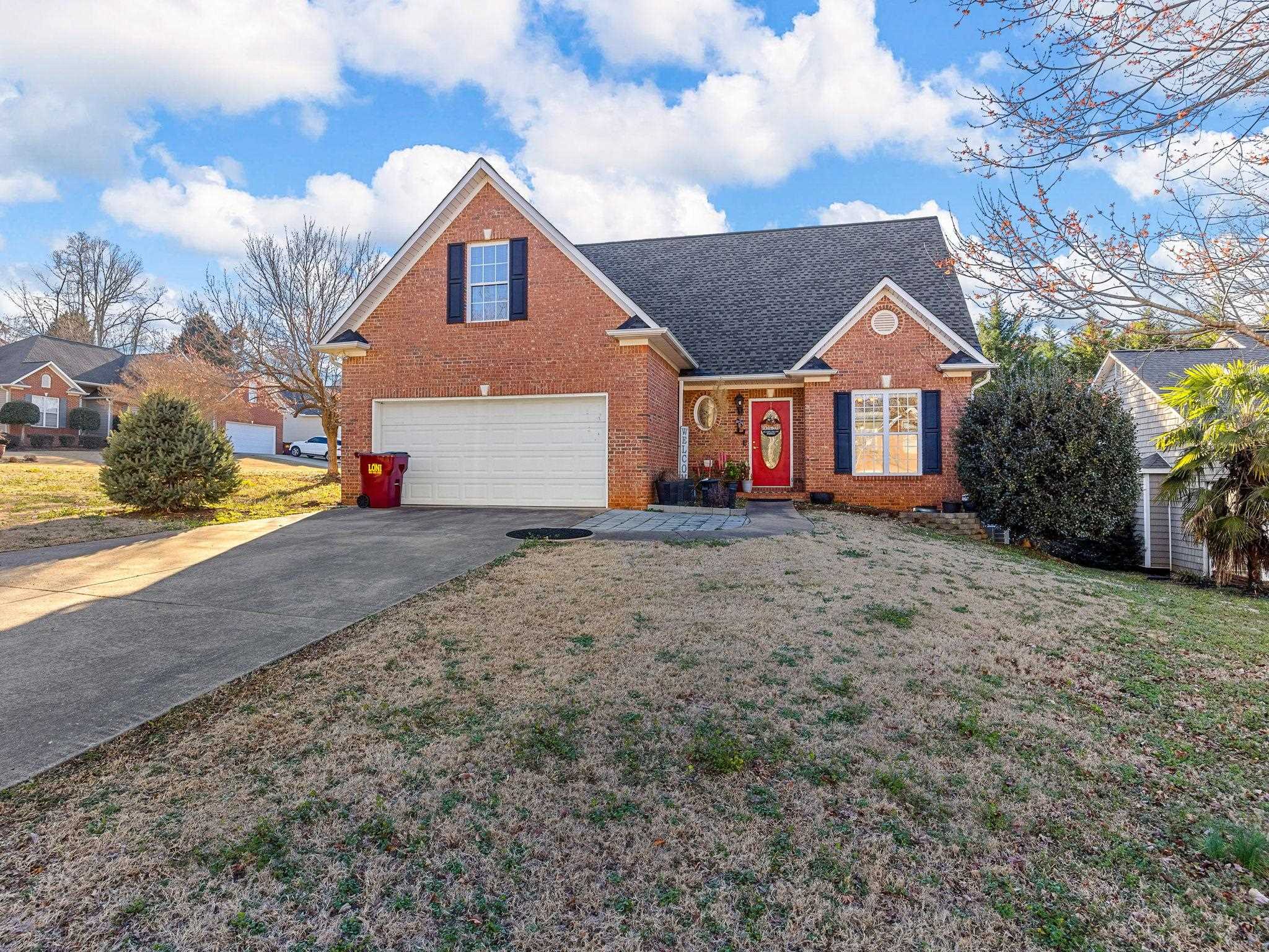 Welcome to 503 Shadetree Court, a stunning all-brick home situated on a desirable corner lot in Moore, SC. This charming 4-bedroom, 2.5-bathroom home offers 1,916 square feet of thoughtfully designed living space.  Step inside to a grand two-story foyer with beautiful wood treads on the staircase, setting the tone for the elegance throughout. The dining room features a tray ceiling with custom wood details and crown molding, while the spacious kitchen boasts abundant cabinetry and a cozy breakfast area that opens seamlessly to the living room with gas logs. A catwalk above offers a striking view of the living space below.  The main-floor primary suite is a true retreat with a double vanity, garden tub, and separate shower. Upstairs, generously sized bedrooms provide plenty of space for family or guests. Wood floors add warmth and character, and the large deck is perfect for entertaining or relaxing.  Located in the wonderful Kingsley Park neighborhood with sidewalks, a playground, and a community pool.  This home is just minutes from fantastic shopping and dining. Don’t miss the opportunity to make this beautiful home yours—schedule a showing today!  The main-floor primary suite is a true retreat with a double vanity, garden tub, and separate shower. Upstairs, generously sized bedrooms provide plenty of space for family or guests. Wood floors add warmth and character, and the large deck is perfect for entertaining or relaxing.  Located in a wonderful neighborhood with sidewalks, a playground, and a community pool, this home is just minutes from fantastic shopping and dining. Don’t miss the opportunity to make this beautiful home yours—schedule a showing today!