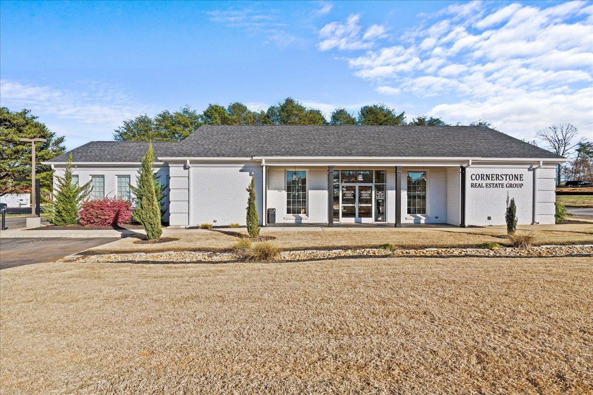 Fully Remodeled and Updated as the perfect office! Modern work spaces, counters, fixtures etc. 2 Bathrooms. Newly added Conference Room with custom 12 person Quartz top table, built in benches and lockers, powered shades. In total, there are 2 private offices, 8 work space cubicles and 3 bar-space work stations. Immaculate landscaping and aesthetics! Very high traffic count in the heart of Lyman, close to Spartanburg, Greer and Greenville. Great opportunity!
