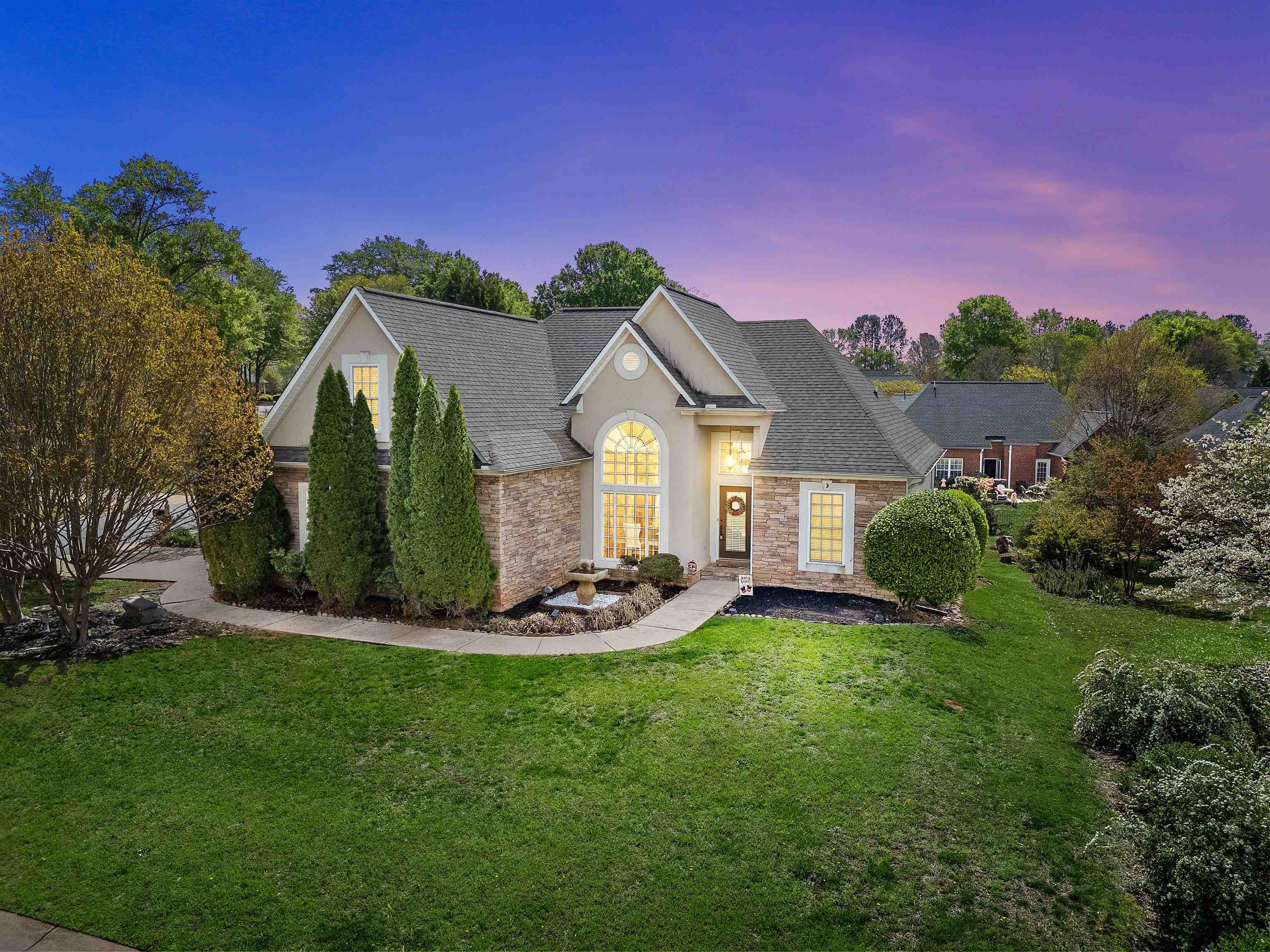 Welcome to 241 Rock Springs Drive, a stunning residence featuring a beautiful blend of stone, stucco, and vinyl exterior, complemented by mature landscaping and a water fountain. This home offers 3 spacious bedrooms, 2 bathrooms, and a versatile flex room above the garage, perfect for an office or playroom.  The attached 2-car garage, along with a detached 1-car garage, provides ample parking and storage. Step inside to discover exquisite details, including crown molding and abundant natural light from large windows and glass doors. The inviting living room boasts a striking stone fireplace with a wood mantle and a vaulted ceiling, creating a warm and welcoming atmosphere.  The dining room features an elegant arched window, crown molding, and decorative columns, perfect for entertaining. The gorgeous kitchen is a chef's dream, equipped with a tiled backsplash that extends to the ceiling, adding a beautiful artistic touch. It also includes stainless steel appliances, under-cabinet lighting, and a convenient pass-through window to the living room. A cozy breakfast area with a 2-seat bar and a double-door pantry enhances the kitchen's functionality.  The primary suite, located on the main level, offers a luxurious retreat with separate vanities, custom cabinetry in the closet, a garden tub, and a separate tiled shower. Enjoy direct access to the expansive deck from the primary suite, ideal for outdoor relaxation. Two additional secondary bedrooms provide ample space for family or guests.  Access the flex space above the garage via beautiful wood stairs, which also leads to a large storage area. The laundry room features upper cabinets for added convenience. The deck, accessible from both the living room and primary suite, is perfect for outdoor gatherings.  Located in the friendly Rock Springs Subdivision which is ideal for walking, jogging, or biking. Residents can enjoy a community pool and playground, making it a perfect place to connect with friends and neighbors. Don’t miss the opportunity to make this beautiful home yours!