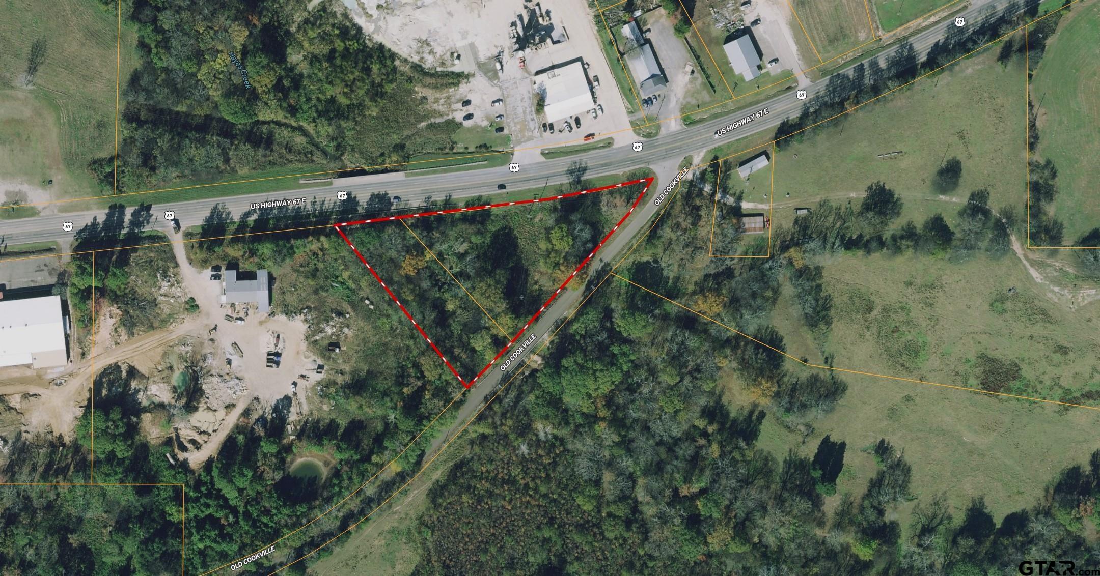 Nice road frontage and high visibility with this commercially zoned 2.432 acre tract.