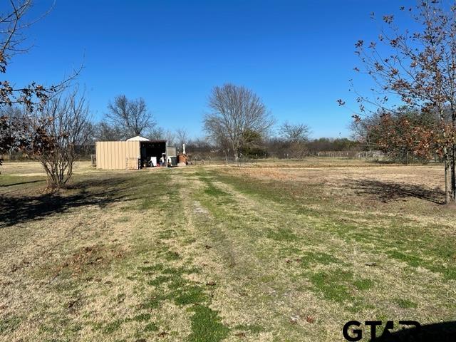 If you are Looking for an Acre of Land to build you a Barndominium, this is what you need. All utilities are installed and a Tiny Home to get you by, while you Build. Partially fenced and cross fenced for the Fur Babies. Convenient to Lake Tawakoni and Lake Fork, and just a short drive East of the Metroplex. Mobile Home Restricted.