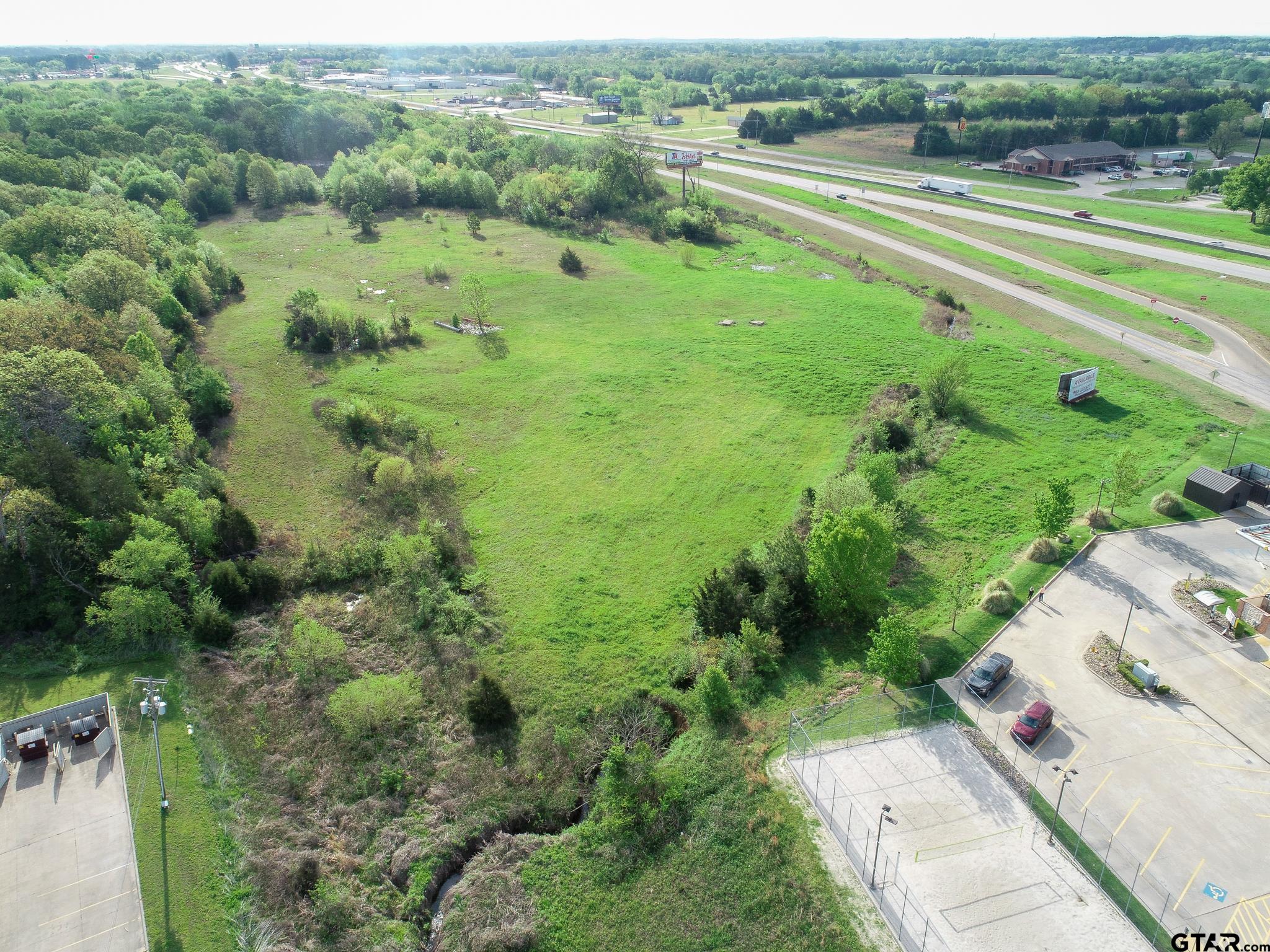 The west end of the property adjacent to the east boundary of Sonic looking south across I-30.