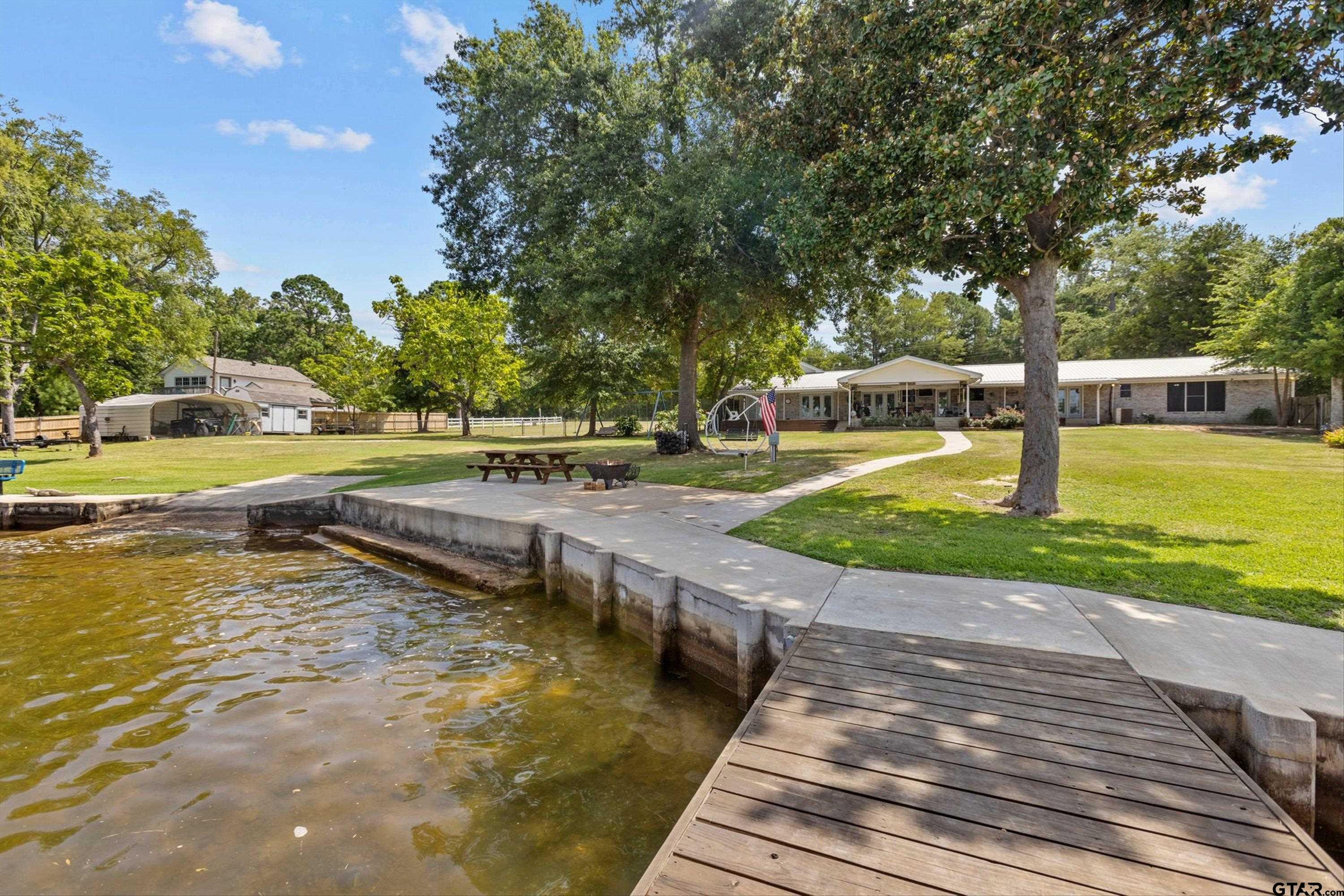 2429 Lakeshore Drive, Jacksonville, Texas 75766, 5 Bedrooms Bedrooms, ,4 BathroomsBathrooms,Single Family Detached,For Sale,Lakeshore Drive,23009864