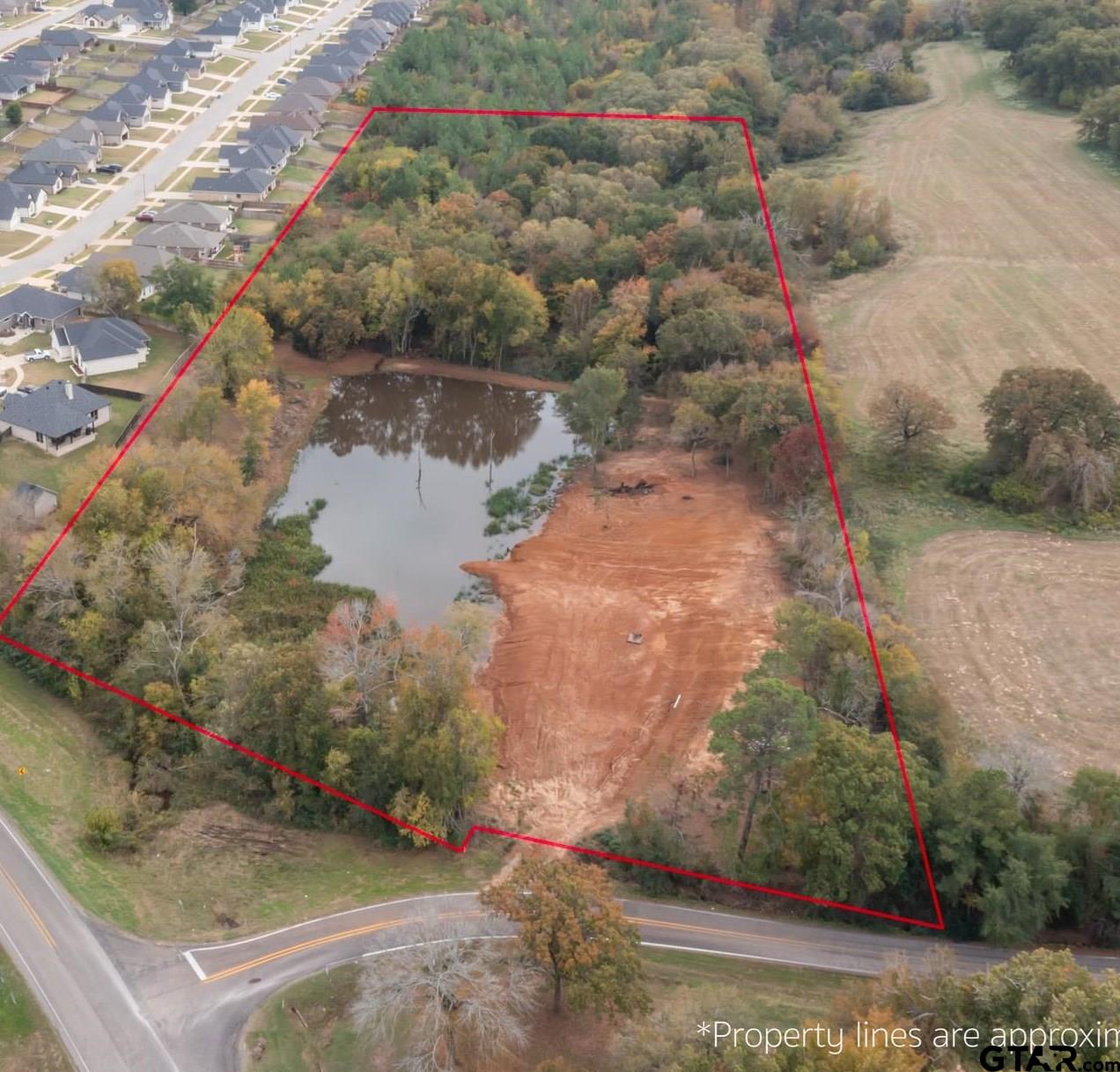 8.234 Acres. Stocked 2 acre pond, Building pad in place.