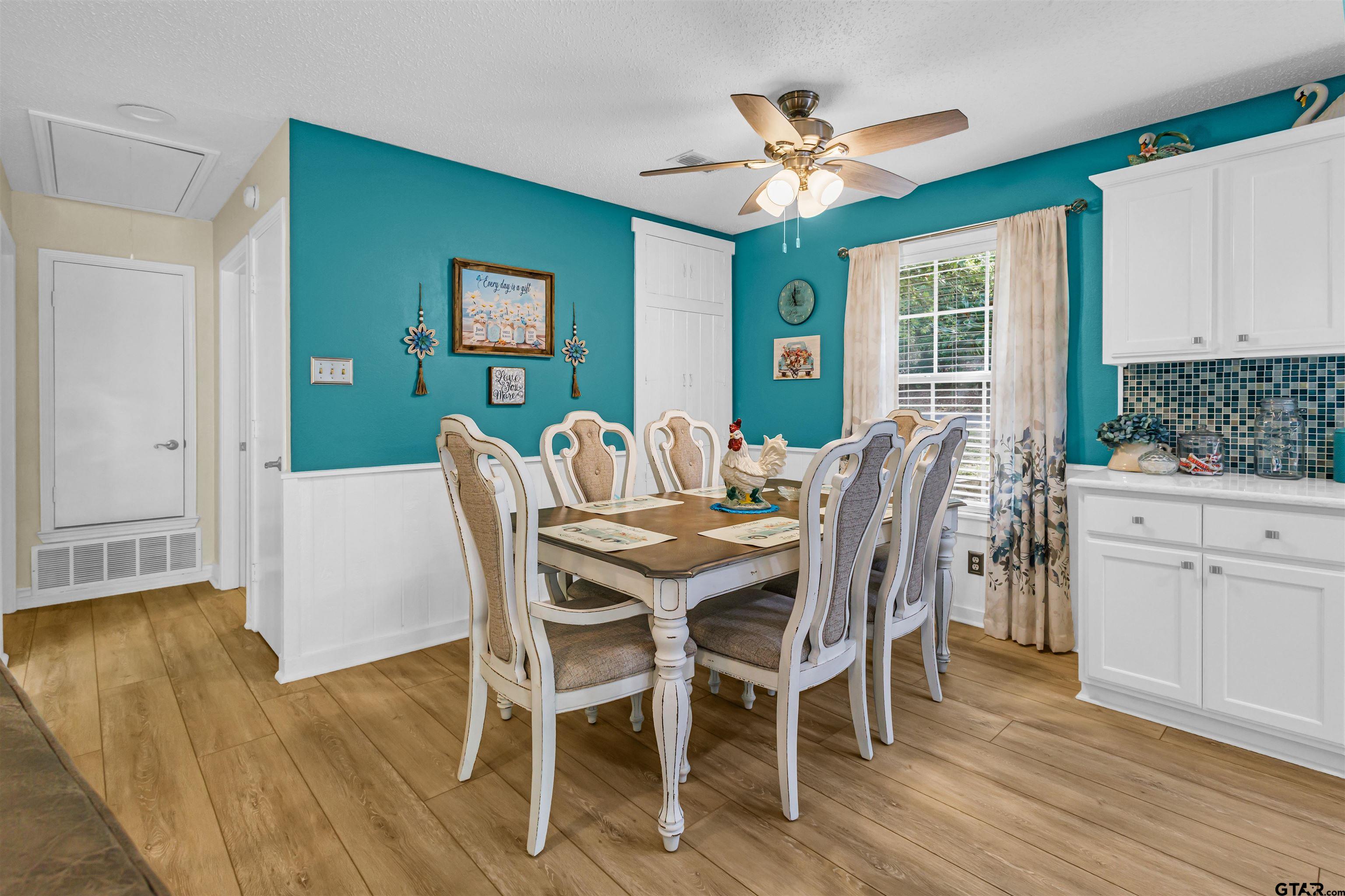 Dining Area/Kitchen - Stacked W/D behind the doors